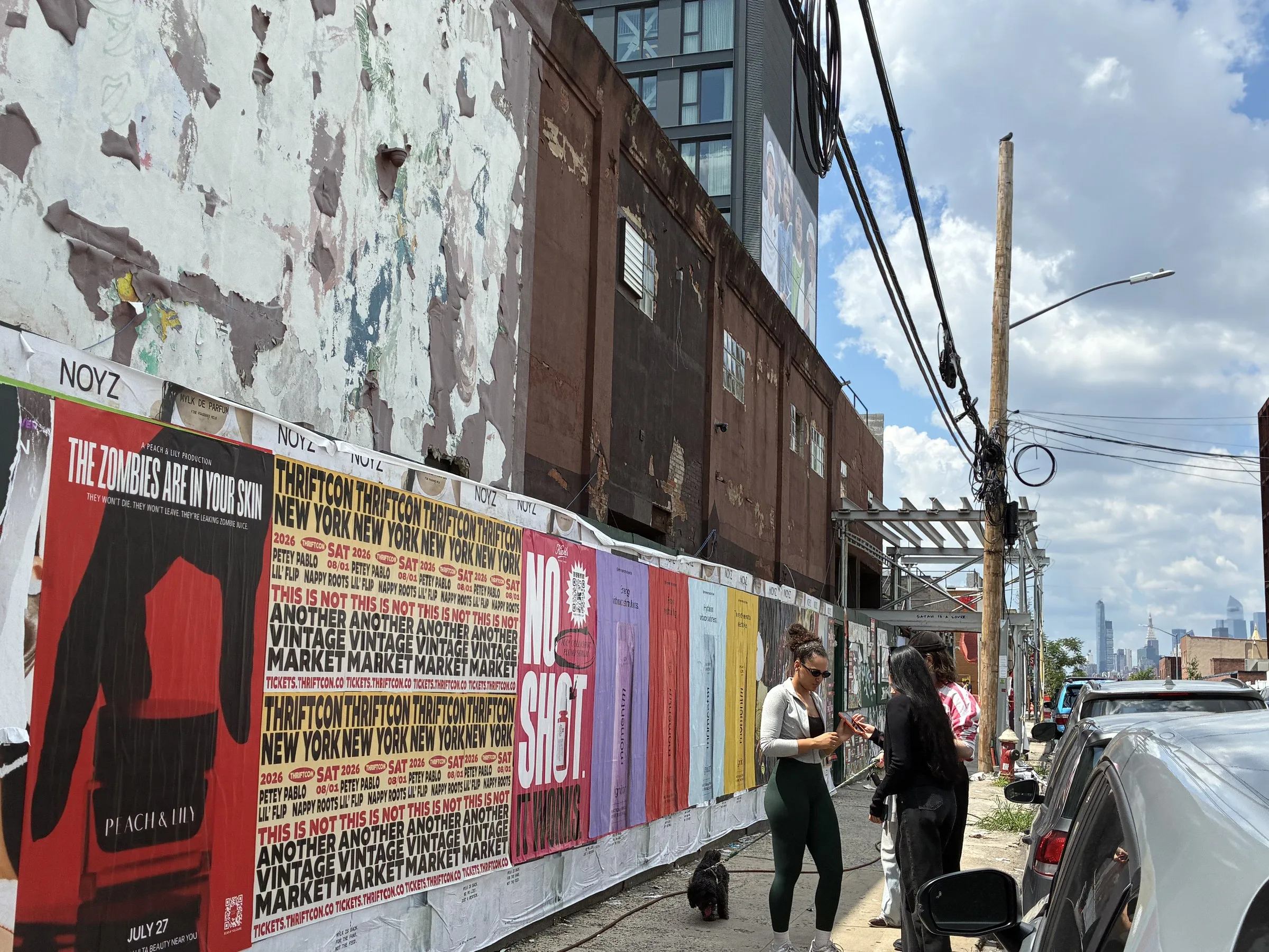 Momentm wheatpaste, stencil and takeaway poster campaign across SoHo, the Lower East Side and Williamsburg by Beyond Street Media