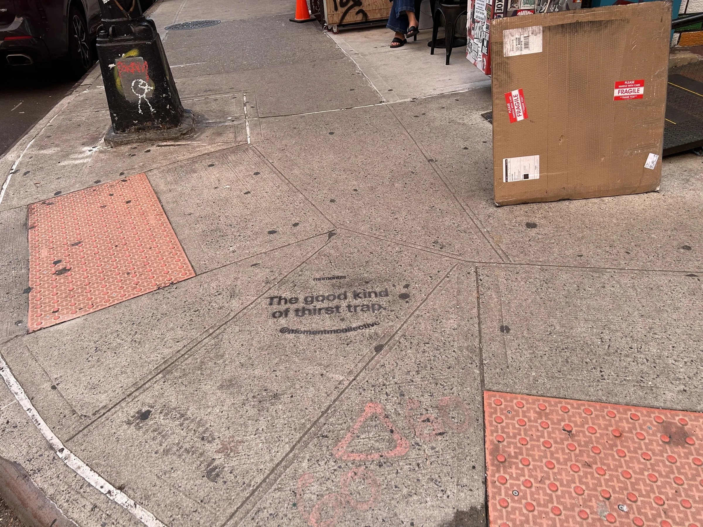 Momentm wheatpaste, stencil and takeaway poster campaign across SoHo, the Lower East Side and Williamsburg by Beyond Street Media