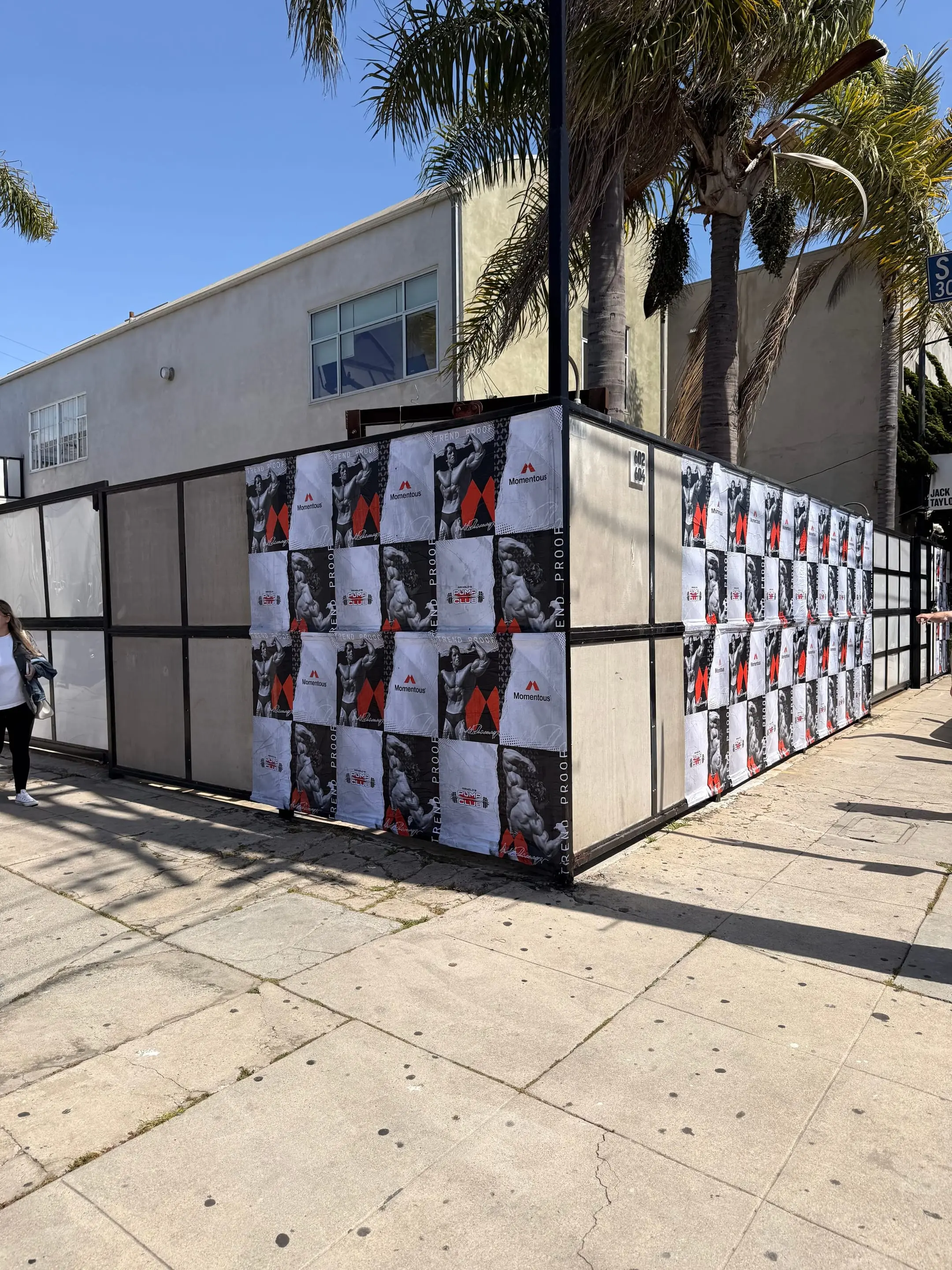 Large-scale wheatpaste campaign on construction hoarding in Los Angeles, CA by Beyond Street Media