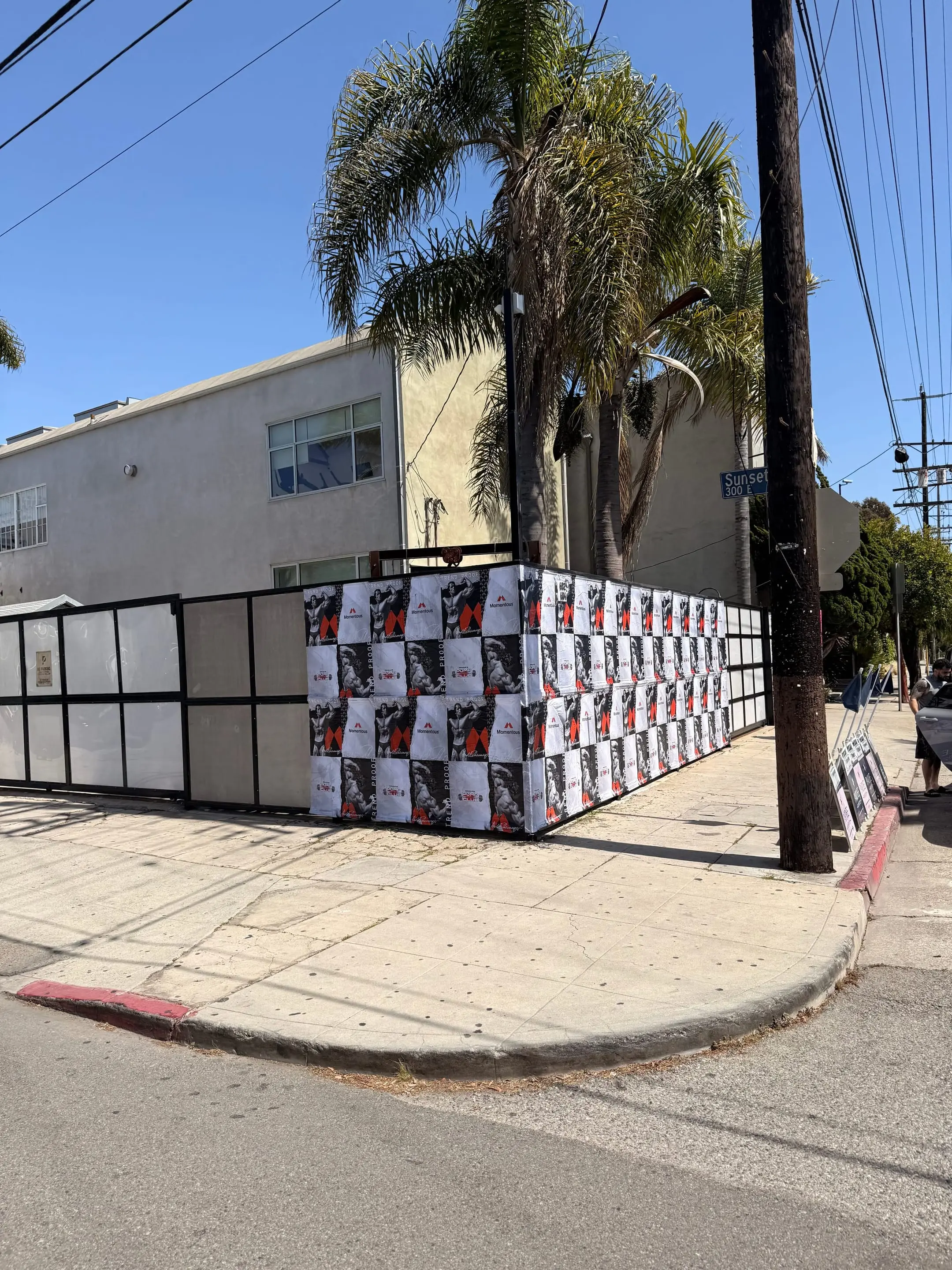Large-scale wheatpaste campaign on construction hoarding in Los Angeles, CA by Beyond Street Media