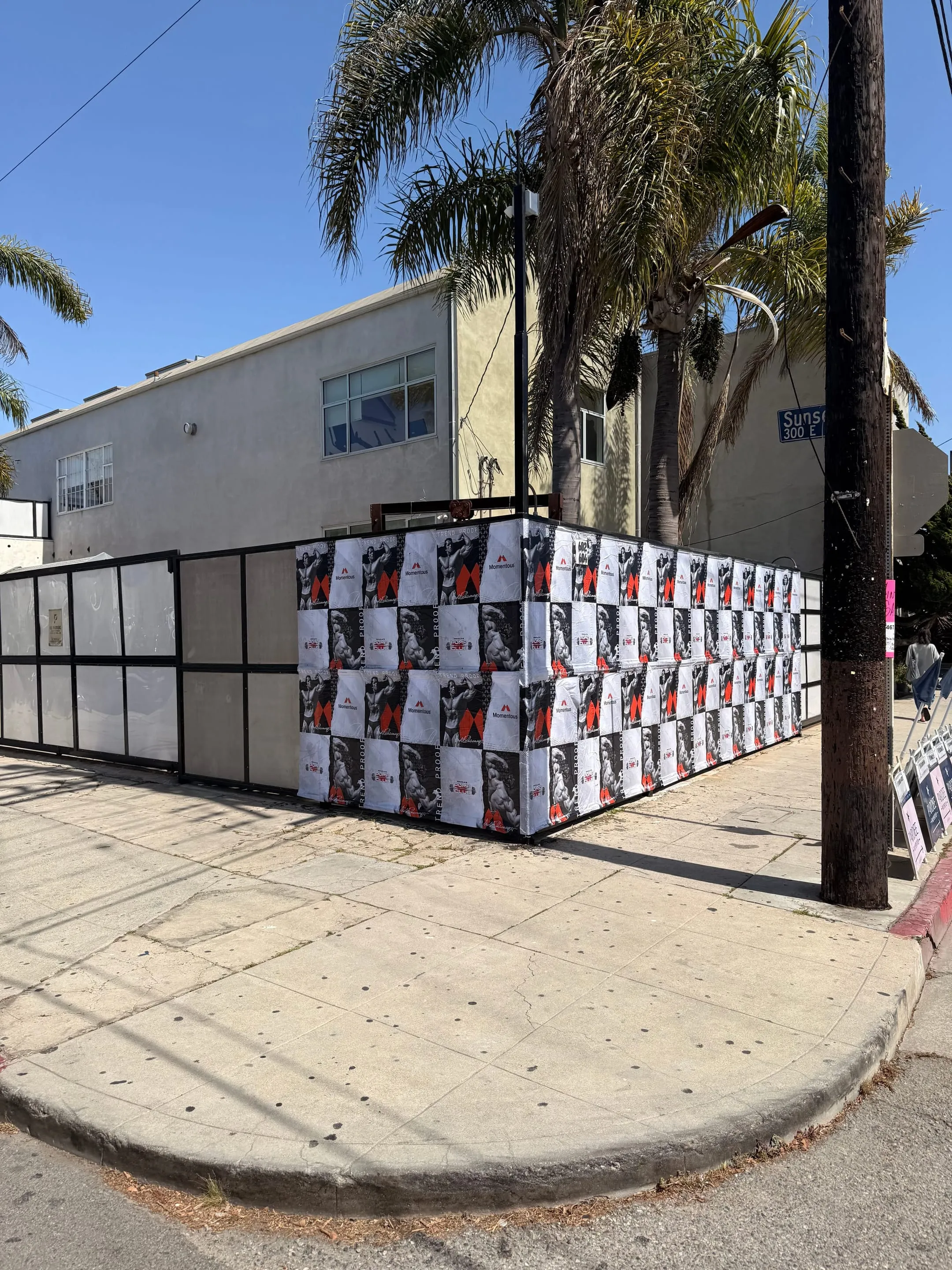 Large-scale wheatpaste campaign on construction hoarding in Los Angeles, CA by Beyond Street Media