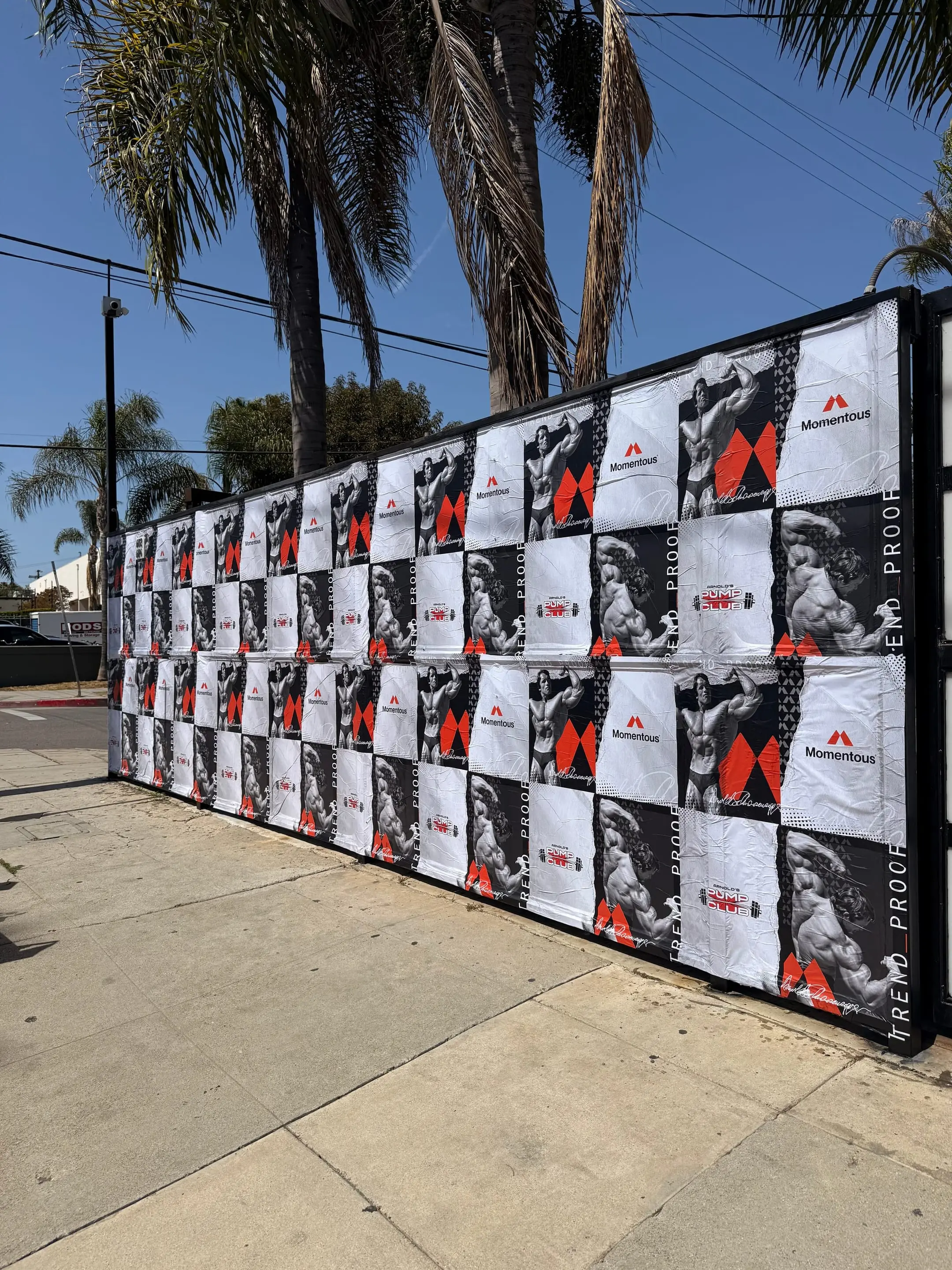 Large-scale wheatpaste campaign on construction hoarding in Los Angeles, CA by Beyond Street Media