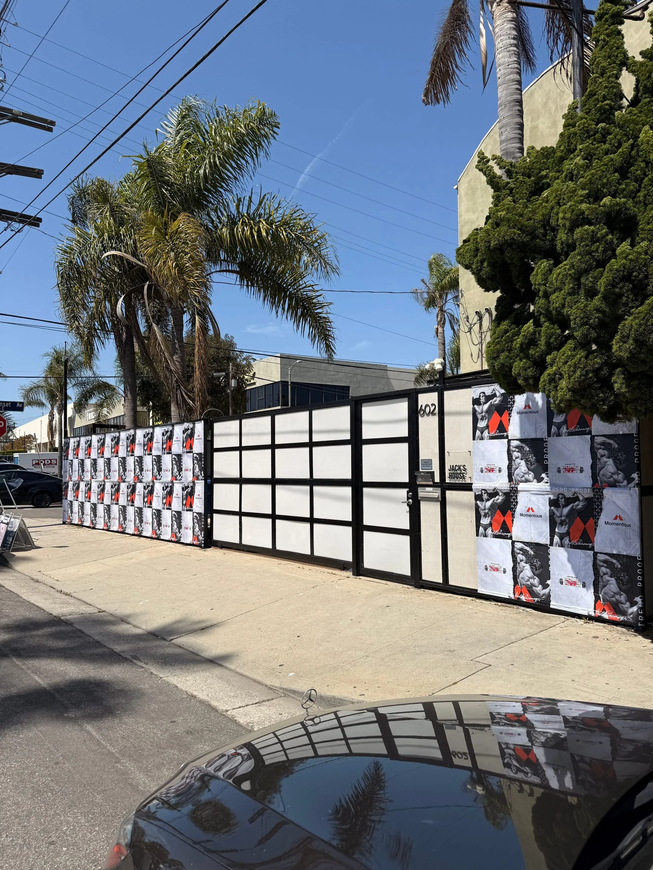Large-scale wheatpaste campaign on construction hoarding in Los Angeles, CA by Beyond Street Media