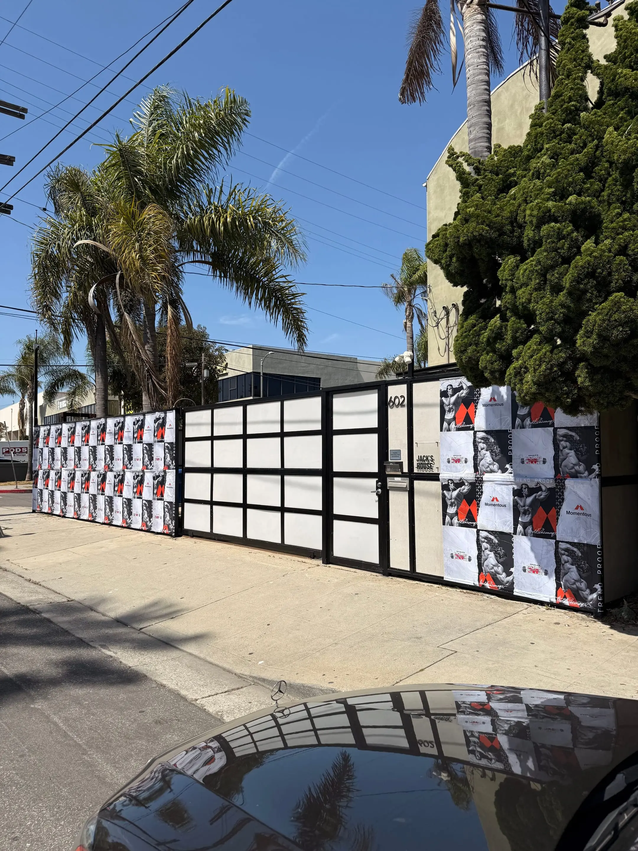 Large-scale wheatpaste campaign on construction hoarding in Los Angeles, CA by Beyond Street Media