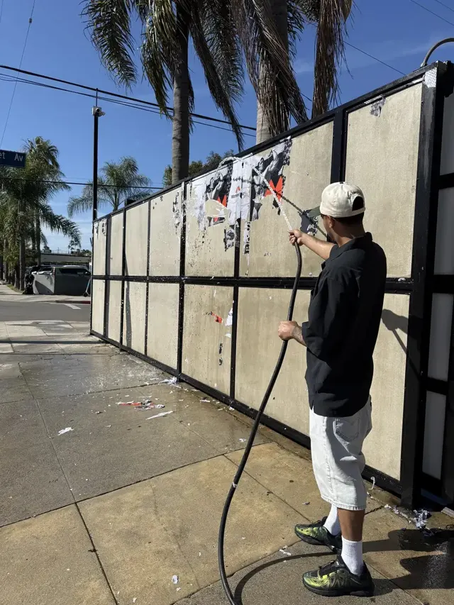 Large-scale wheatpaste campaign on construction hoarding in Los Angeles, CA by Beyond Street Media (photo 9 of 16).