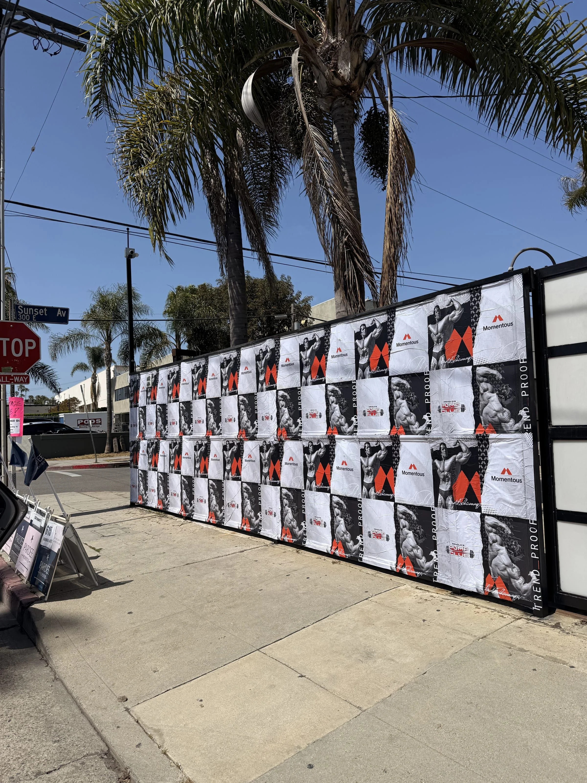 Large-scale wheatpaste campaign on construction hoarding in Los Angeles, CA by Beyond Street Media