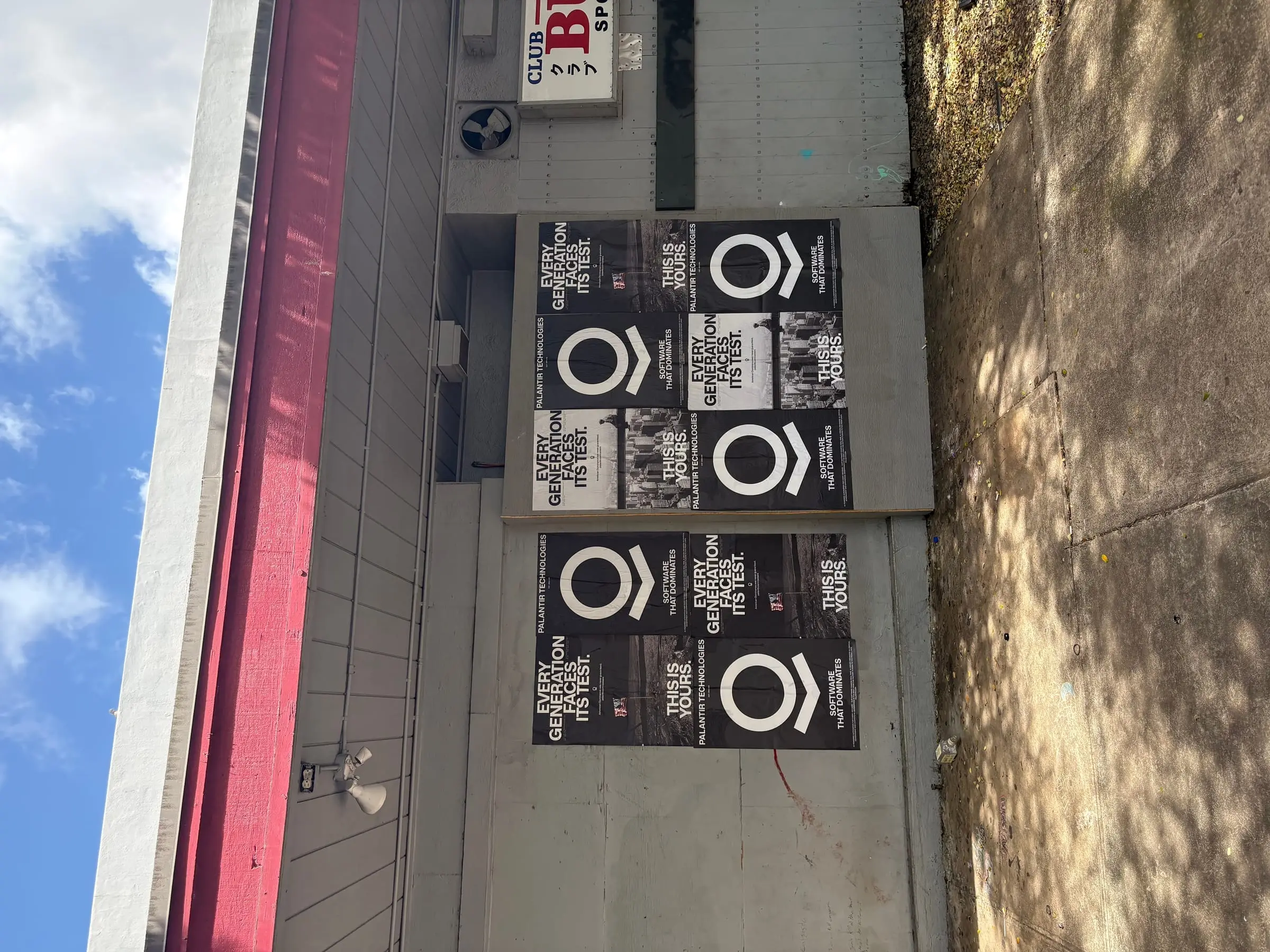 Wheatpaste poster install for Palantir Technologies on Honolulu, HI in Honolulu, HI, black-and-white 'Every Generation Faces Its Test / This Is Yours' paste-up poster install by Beyond Street Media