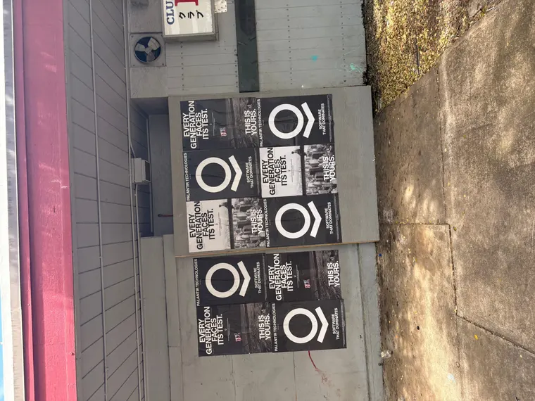 Wheatpaste poster install for Palantir Technologies on Honolulu, HI in Honolulu, HI, black-and-white 'Every Generation Faces Its Test / This Is Yours' paste-up poster install by Beyond Street Media