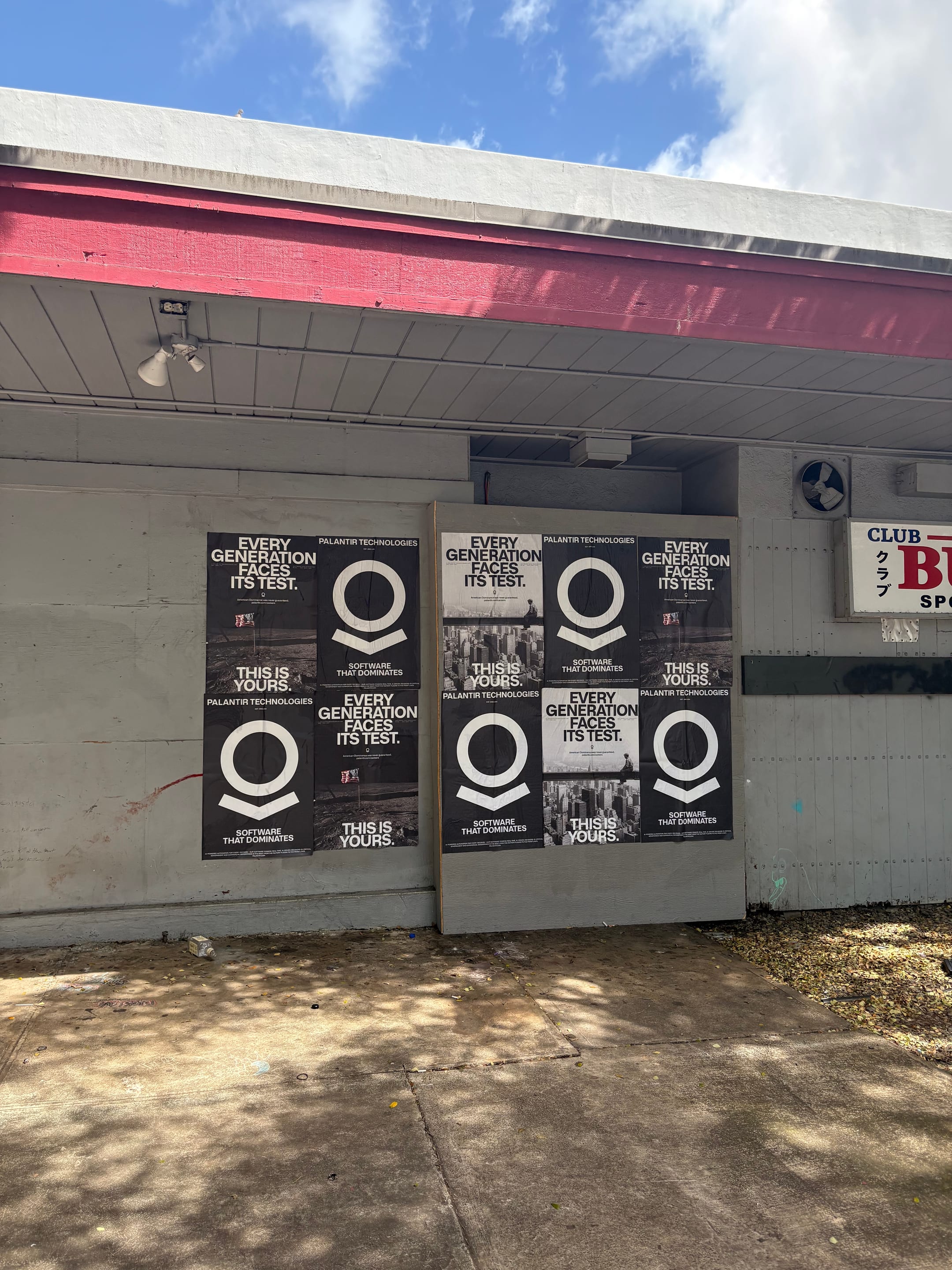 Wheatpaste poster install for Palantir Technologies on Honolulu, HI in Honolulu, HI, black-and-white 'Every Generation Faces Its Test / This Is Yours' paste-up poster install by Beyond Street Media