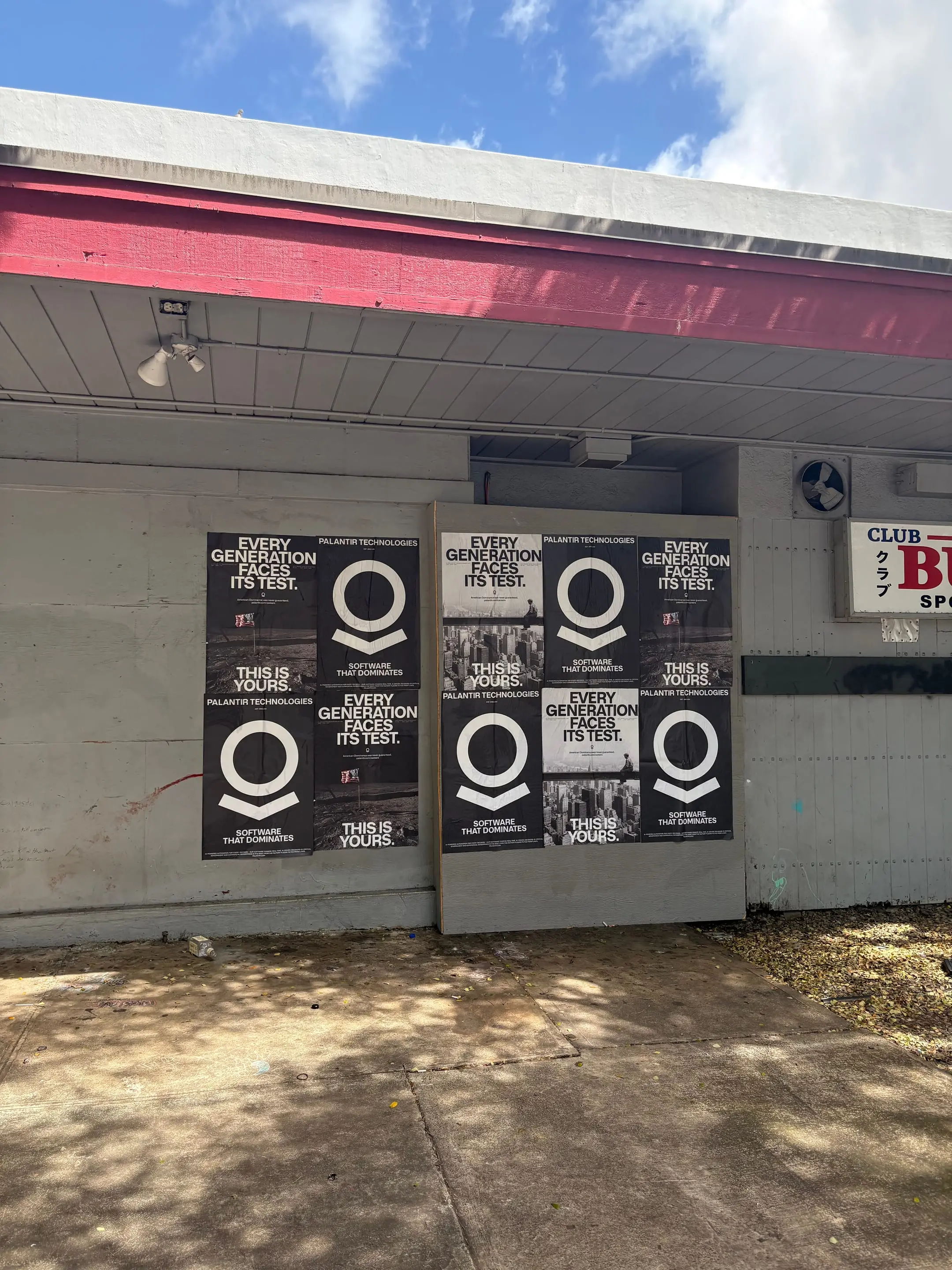 Wheatpaste poster install for Palantir Technologies on Honolulu, HI in Honolulu, HI, black-and-white 'Every Generation Faces Its Test / This Is Yours' paste-up poster install by Beyond Street Media