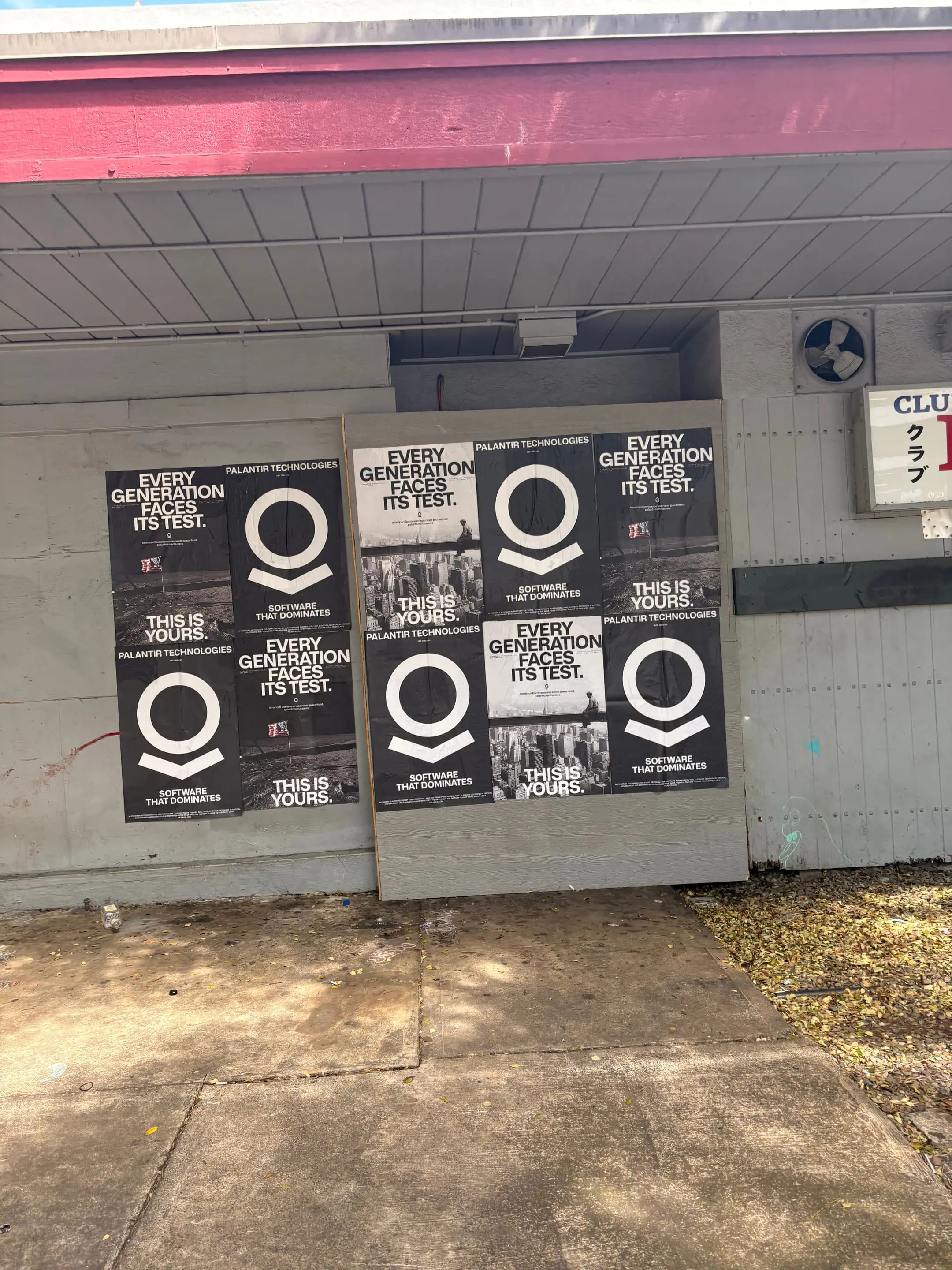 Wheatpaste poster install for Palantir Technologies on Honolulu, HI in Honolulu, HI, black-and-white 'Every Generation Faces Its Test / This Is Yours' paste-up poster install by Beyond Street Media