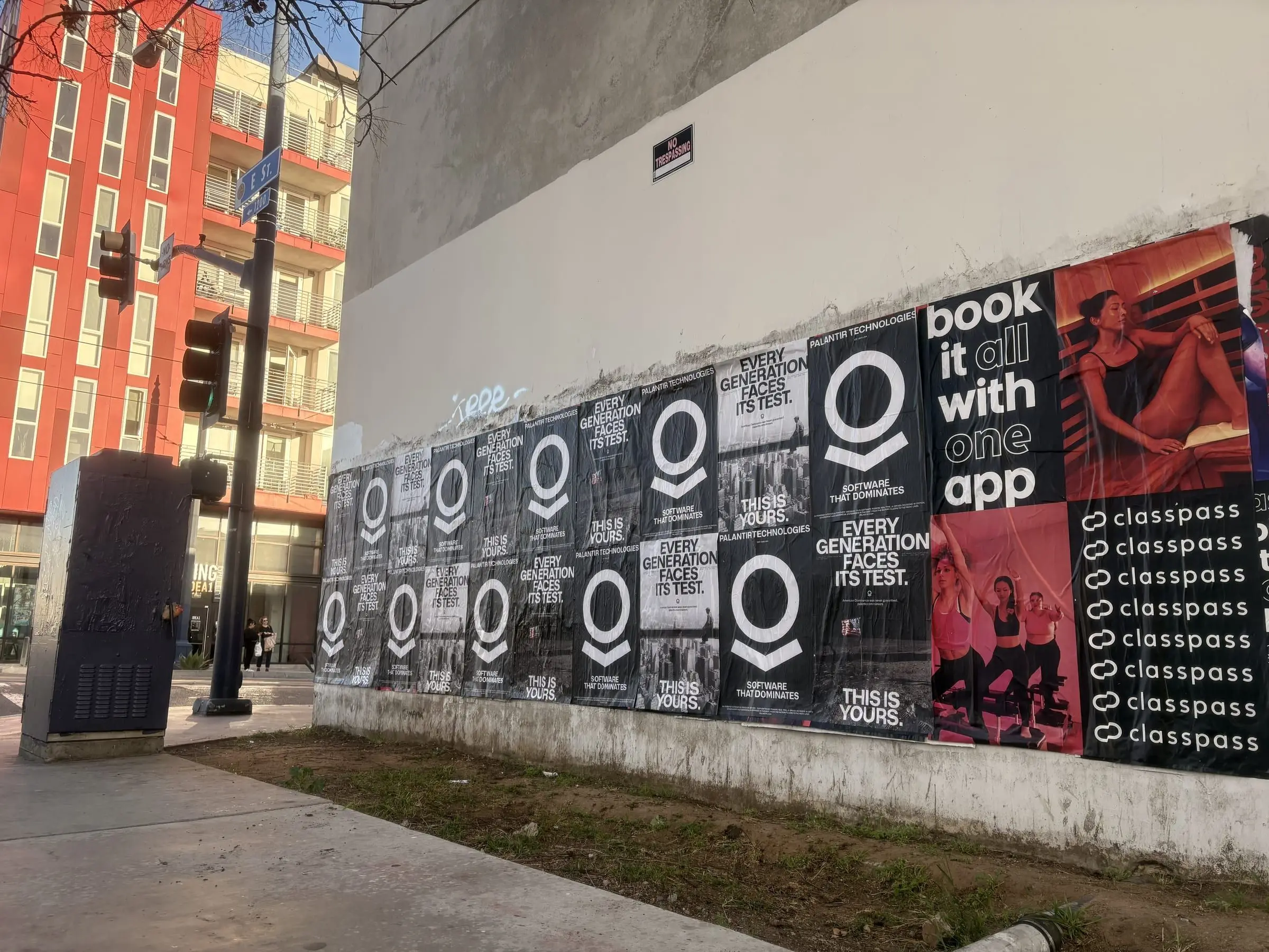 Wheatpaste poster install for Palantir Technologies on San Diego, CA in San Diego, CA, black-and-white 'Every Generation Faces Its Test / This Is Yours' paste-up poster install by Beyond Street Media