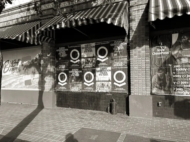Wheatpaste poster install for Palantir Technologies on San Diego, CA in San Diego, CA, black-and-white 'Every Generation Faces Its Test / This Is Yours' paste-up poster install by Beyond Street Media (photo 32 of 45).