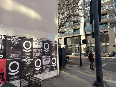Wheatpaste poster install for Palantir Technologies on San Diego, CA in San Diego, CA, black-and-white 'Every Generation Faces Its Test / This Is Yours' paste-up poster install by Beyond Street Media (photo 35 of 45).