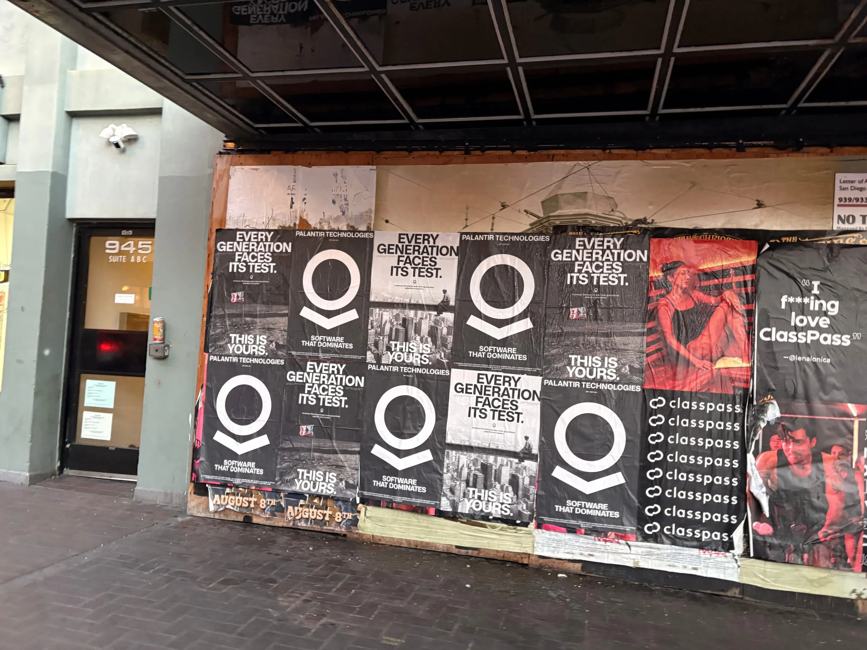 Wheatpaste poster install for Palantir Technologies on San Diego, CA in San Diego, CA, black-and-white 'Every Generation Faces Its Test / This Is Yours' paste-up poster install by Beyond Street Media
