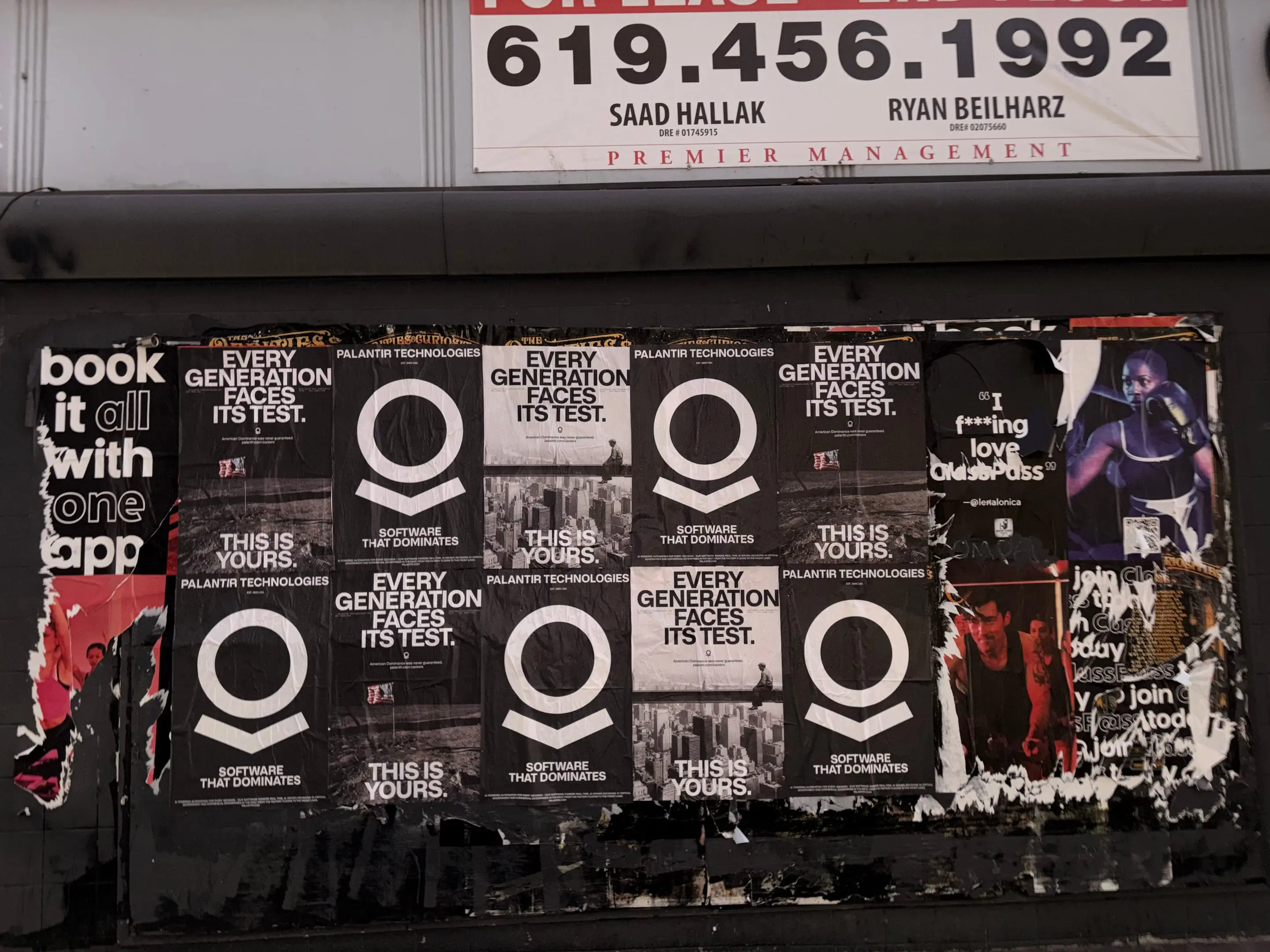 Wheatpaste poster install for Palantir Technologies on San Diego, CA in San Diego, CA, black-and-white 'Every Generation Faces Its Test / This Is Yours' paste-up poster install by Beyond Street Media