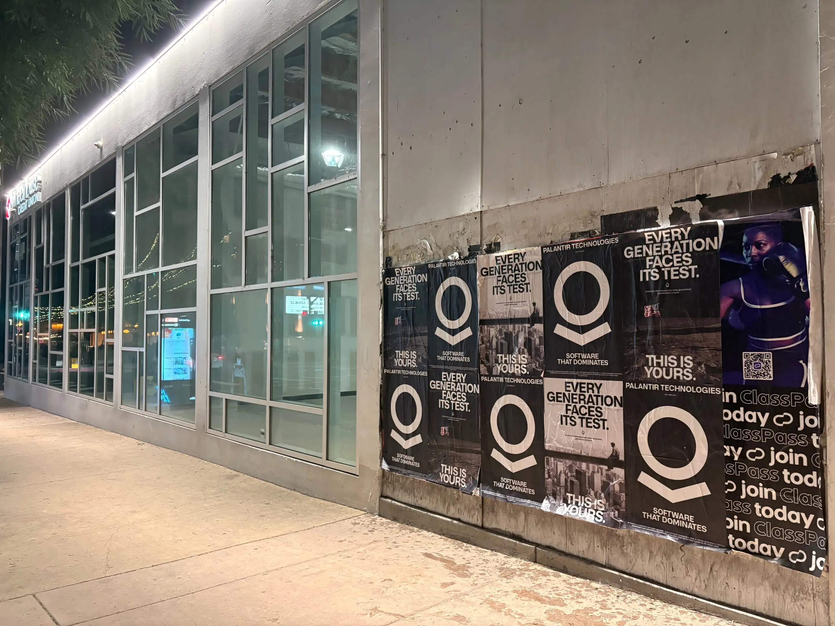 Wheatpaste poster install for Palantir Technologies on San Diego, CA in San Diego, CA, black-and-white 'Every Generation Faces Its Test / This Is Yours' paste-up poster install by Beyond Street Media