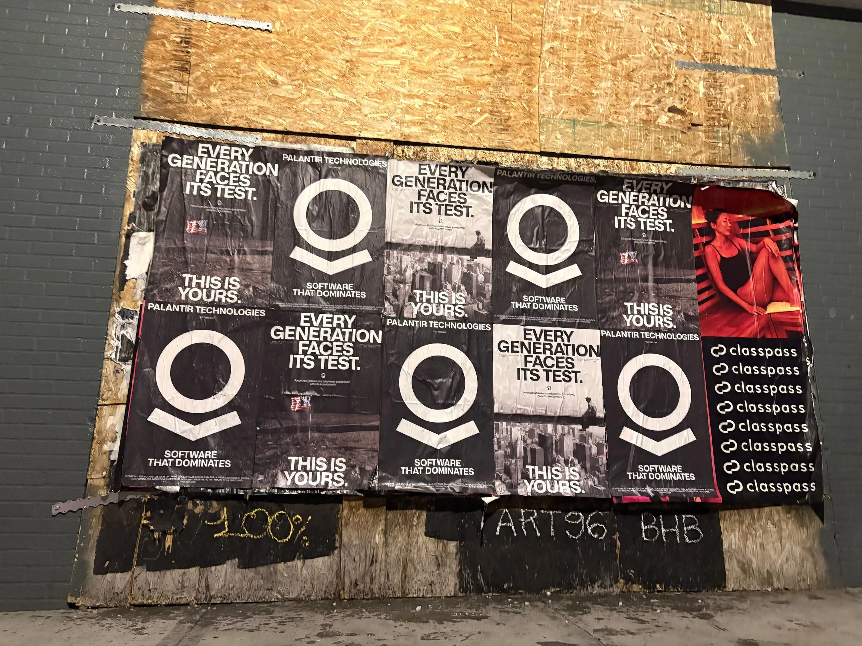 Wheatpaste poster install for Palantir Technologies on San Diego, CA in San Diego, CA, black-and-white 'Every Generation Faces Its Test / This Is Yours' paste-up poster install by Beyond Street Media