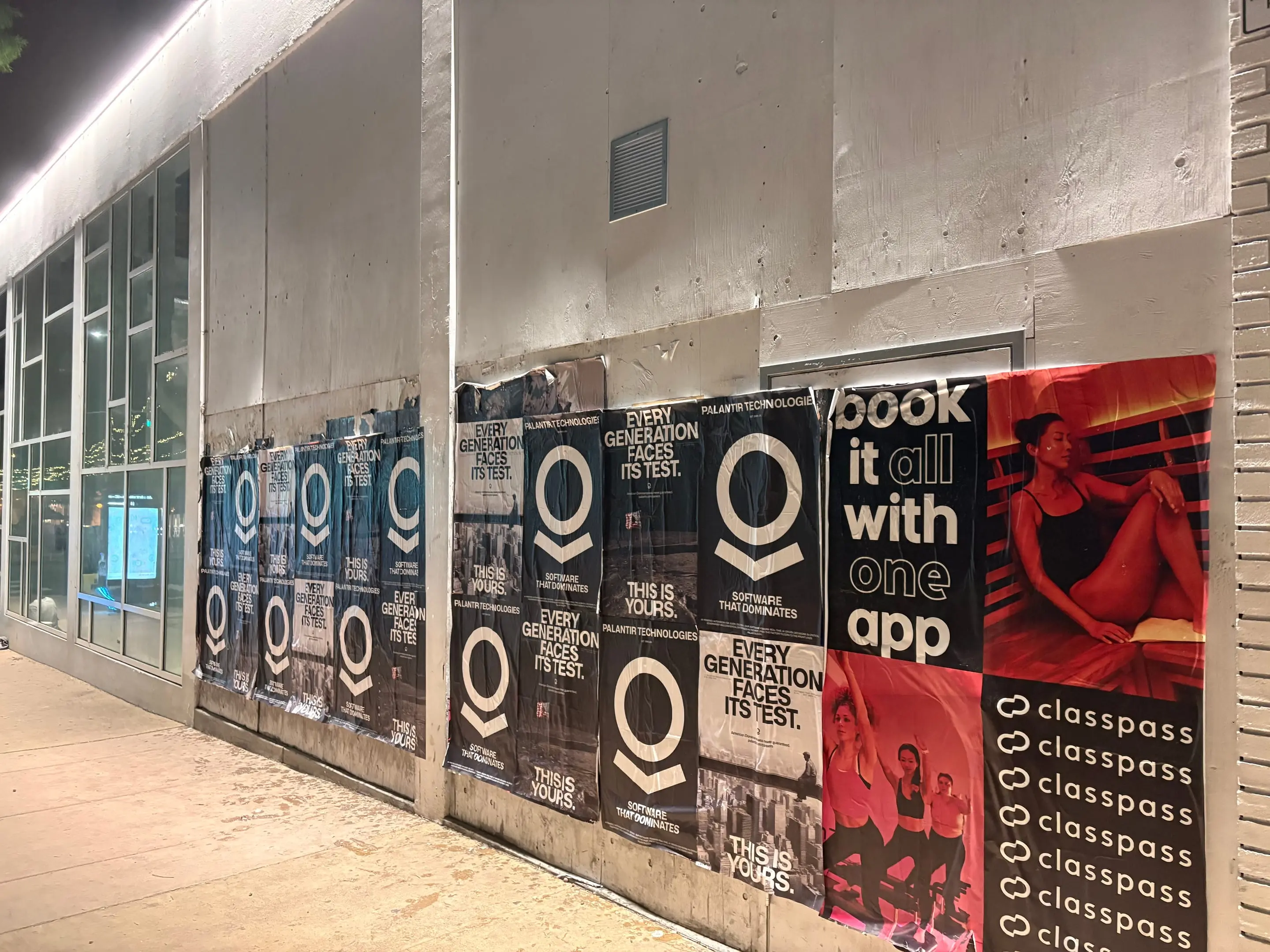 Wheatpaste poster install for Palantir Technologies on San Diego, CA in San Diego, CA, black-and-white 'Every Generation Faces Its Test / This Is Yours' paste-up poster install by Beyond Street Media