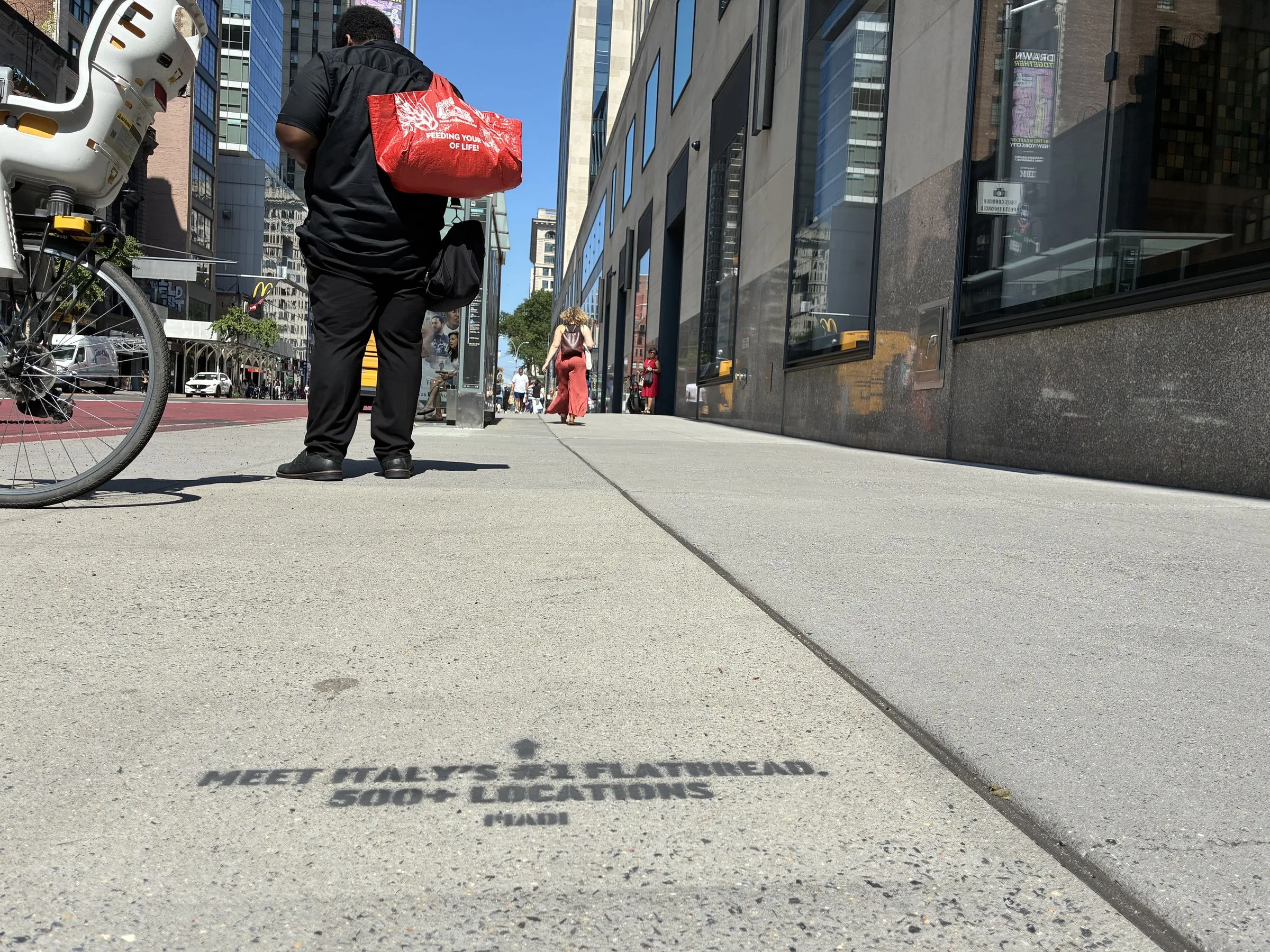 PIADI La Piadineria chalk stencil wayfinding campaign around 23rd St and Broadway in New York by Beyond Street Media