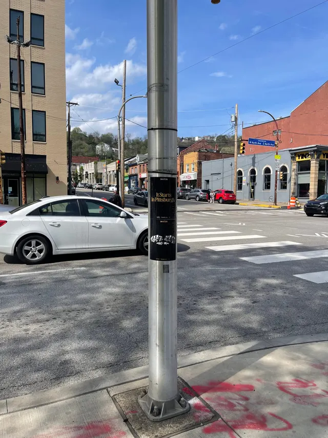 Pole sticker campaign for 'It Starts In Pittsburgh' on city light poles in Pittsburgh, PA by Beyond Street Media (photo 18 of 46).