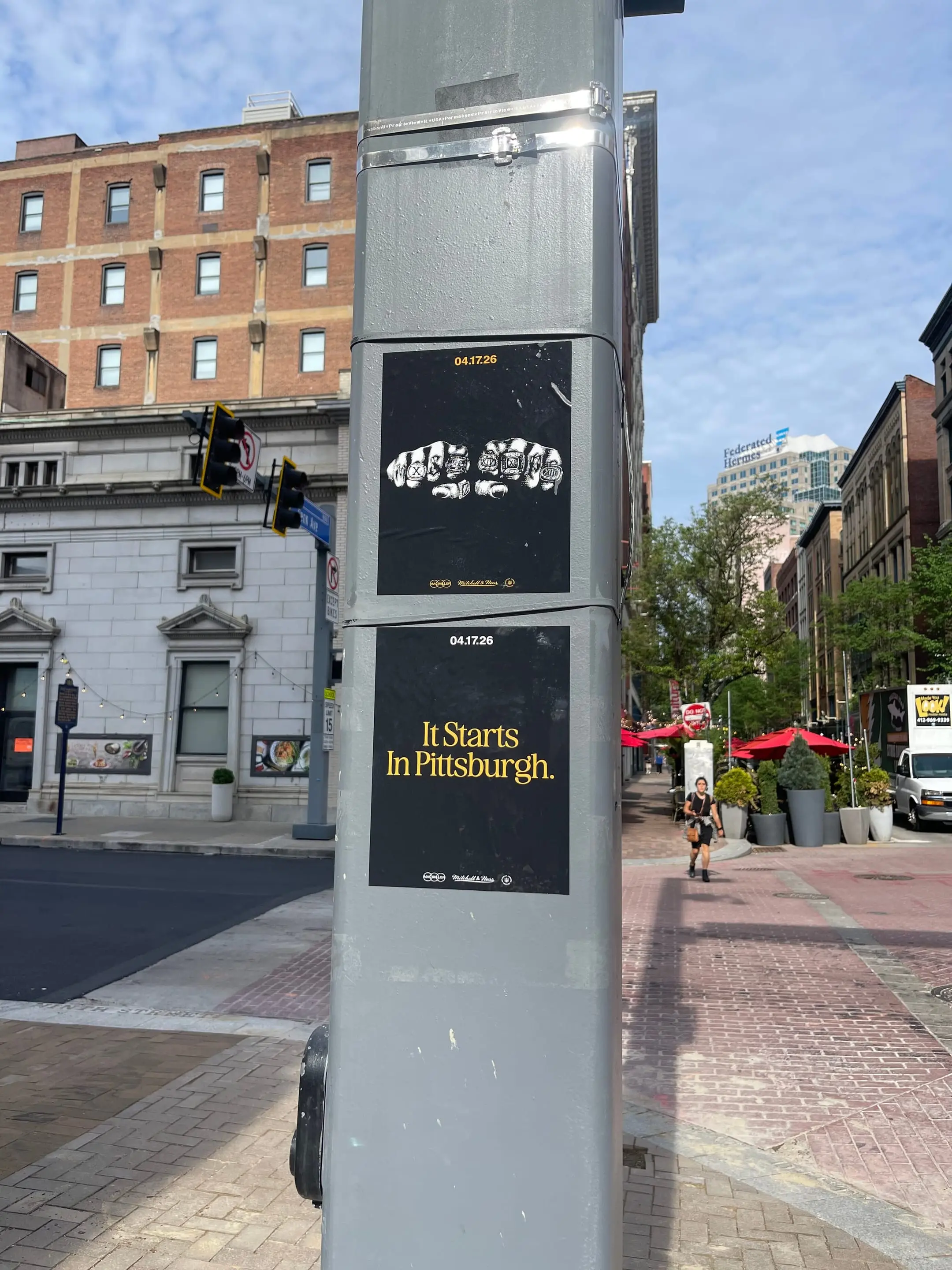 Pole sticker campaign for 'It Starts In Pittsburgh' on city light poles in Pittsburgh, PA by Beyond Street Media