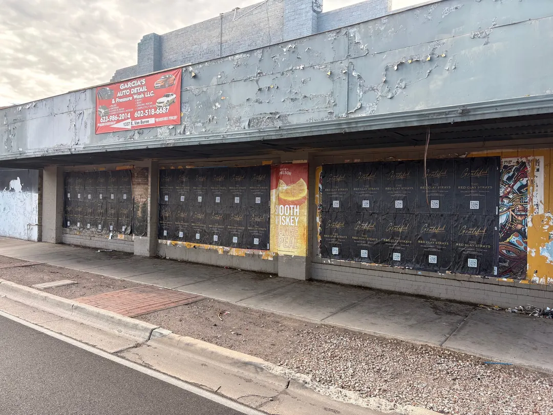 Red Clay Strays wheatpaste show poster in downtown Phoenix by Beyond Street Media (photo 4 of 24).