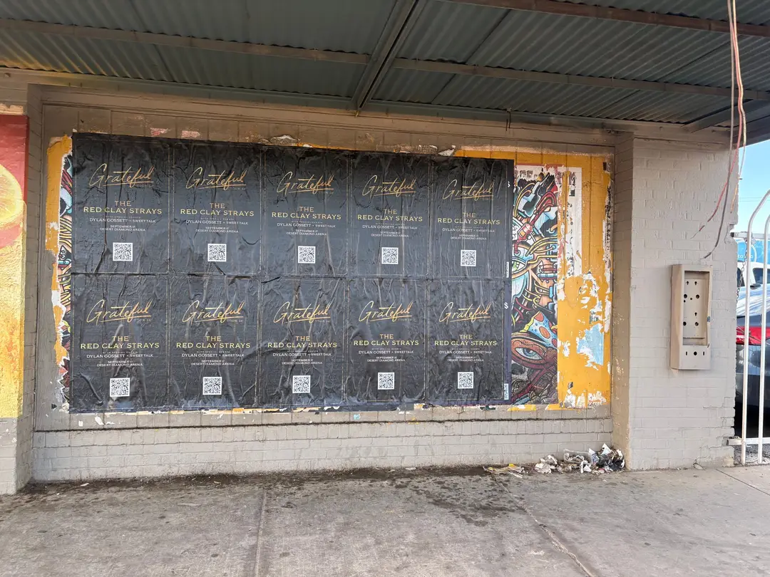 Red Clay Strays wheatpaste show poster in downtown Phoenix by Beyond Street Media (photo 9 of 24).