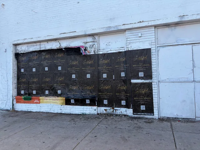 Red Clay Strays wheatpaste show poster in downtown Phoenix by Beyond Street Media (photo 23 of 24).