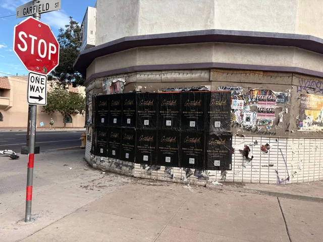 Red Clay Strays wheatpaste show poster in downtown Phoenix by Beyond Street Media (photo 17 of 24).