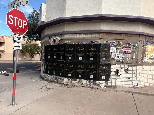 Red Clay Strays wheatpaste show poster in downtown Phoenix by Beyond Street Media (photo 17 of 24).