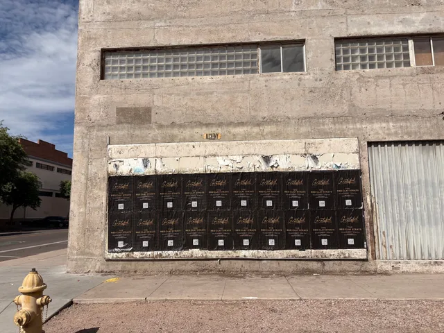 Red Clay Strays wheatpaste show poster in downtown Phoenix by Beyond Street Media (photo 3 of 24).