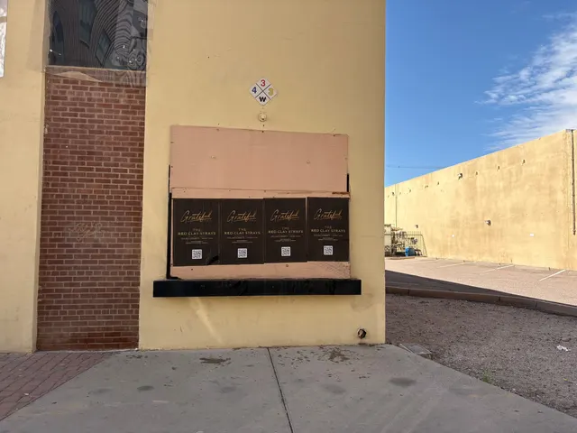 Red Clay Strays wheatpaste show poster in downtown Phoenix by Beyond Street Media (photo 19 of 24).