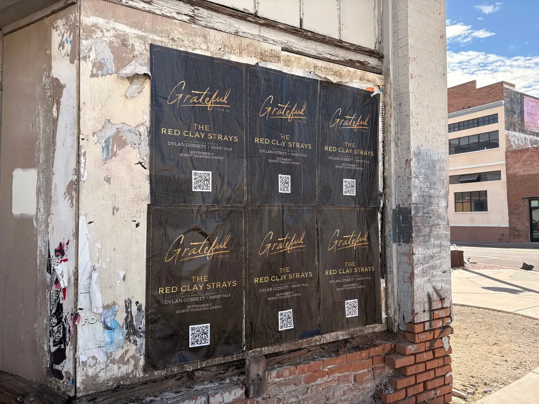 Red Clay Strays wheatpaste show poster in downtown Phoenix by Beyond Street Media