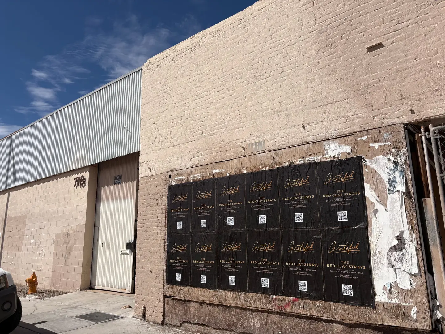Red Clay Strays wheatpaste show poster in downtown Phoenix by Beyond Street Media (photo 6 of 24).