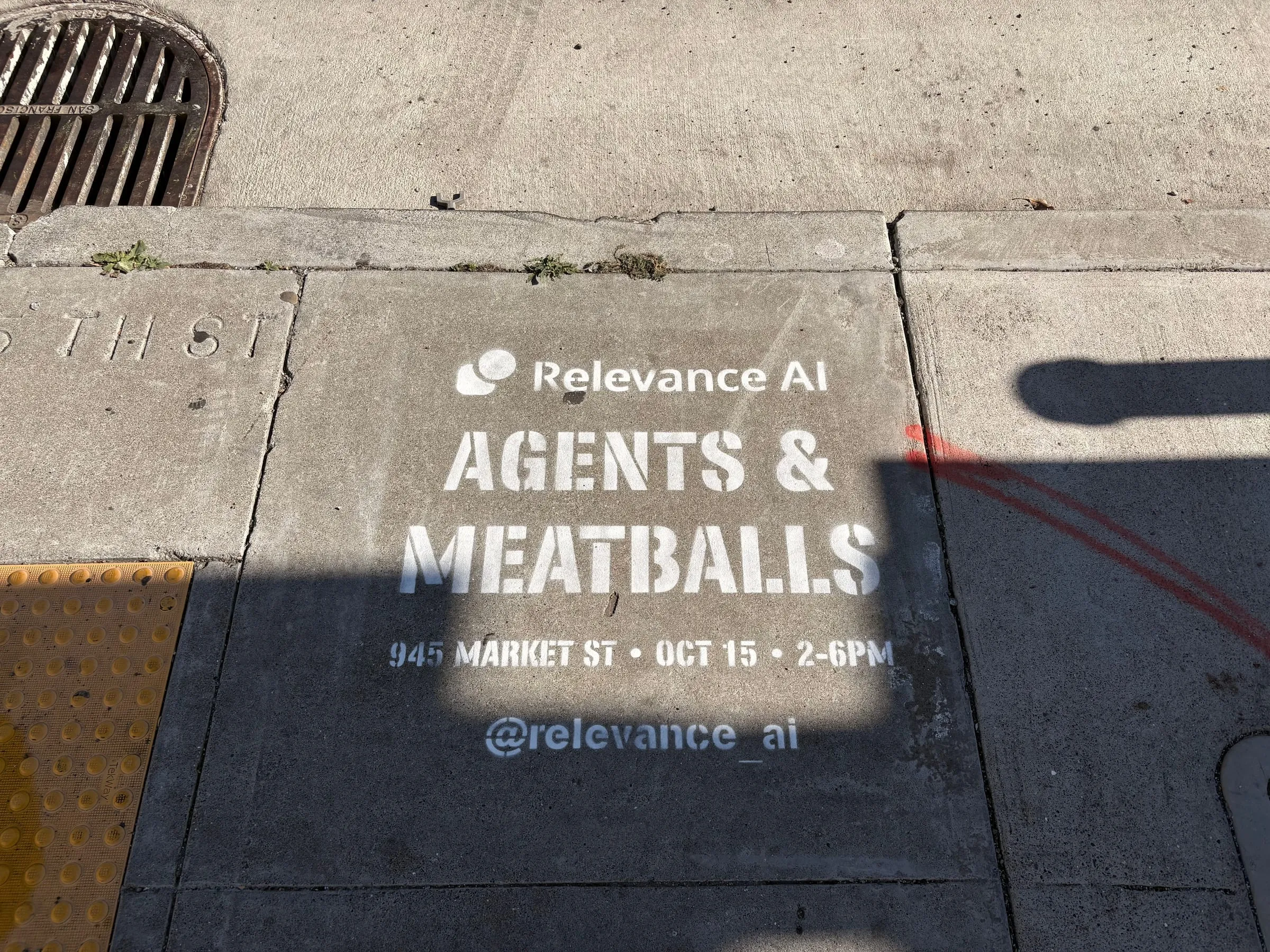 Relevance AI 'Agents & Meatballs' event sidewalk stencil on a San Francisco sidewalk, CA by Beyond Street Media