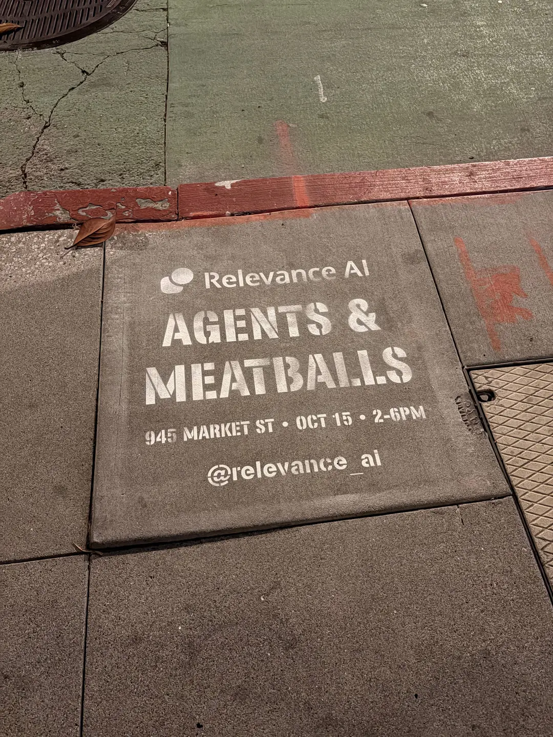 Relevance AI 'Agents & Meatballs' event sidewalk stencil on a San Francisco sidewalk, CA by Beyond Street Media (photo 5 of 12).