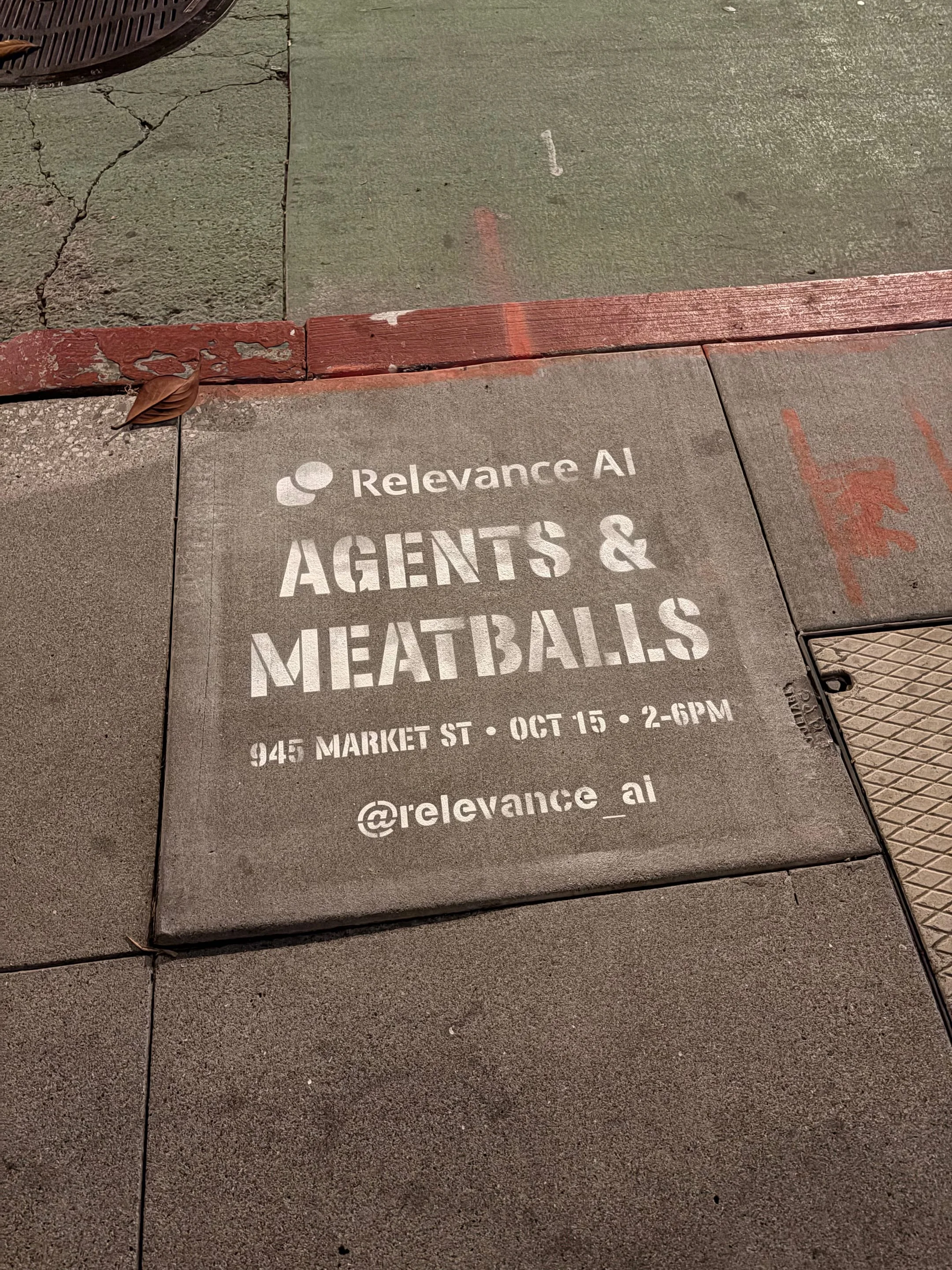 Relevance AI 'Agents & Meatballs' event sidewalk stencil on a San Francisco sidewalk, CA by Beyond Street Media