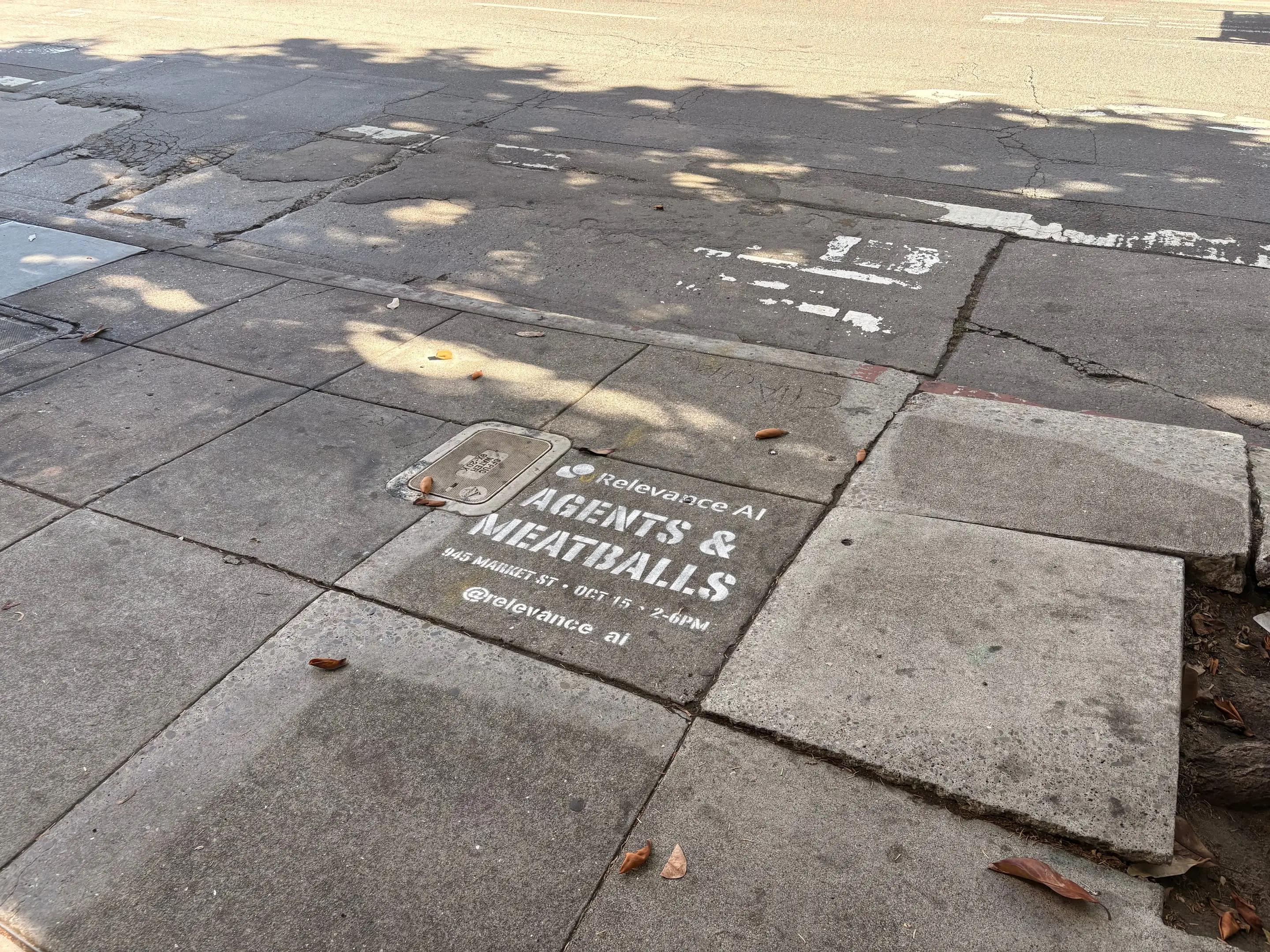 Relevance AI 'Agents & Meatballs' event sidewalk stencil on a San Francisco sidewalk, CA by Beyond Street Media