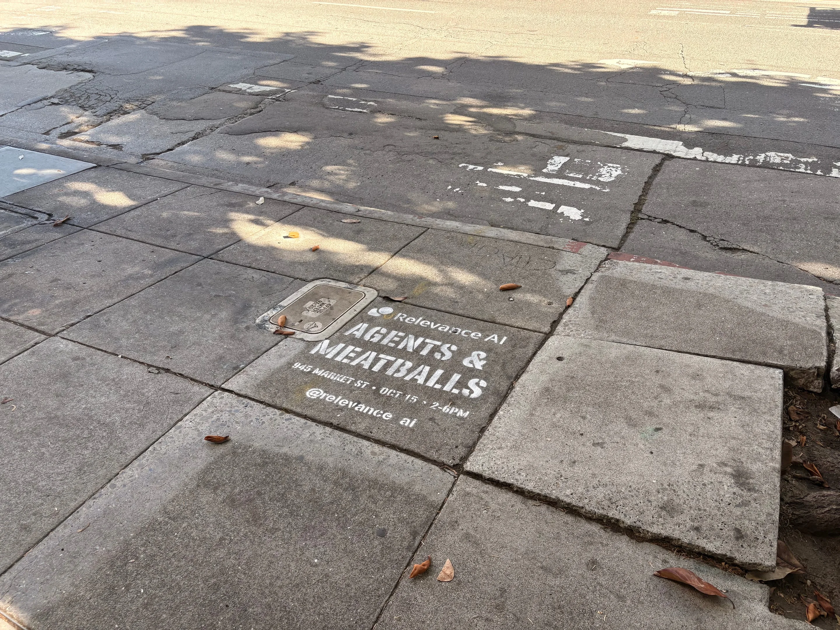 Relevance AI 'Agents & Meatballs' event sidewalk stencil on a San Francisco sidewalk, CA by Beyond Street Media