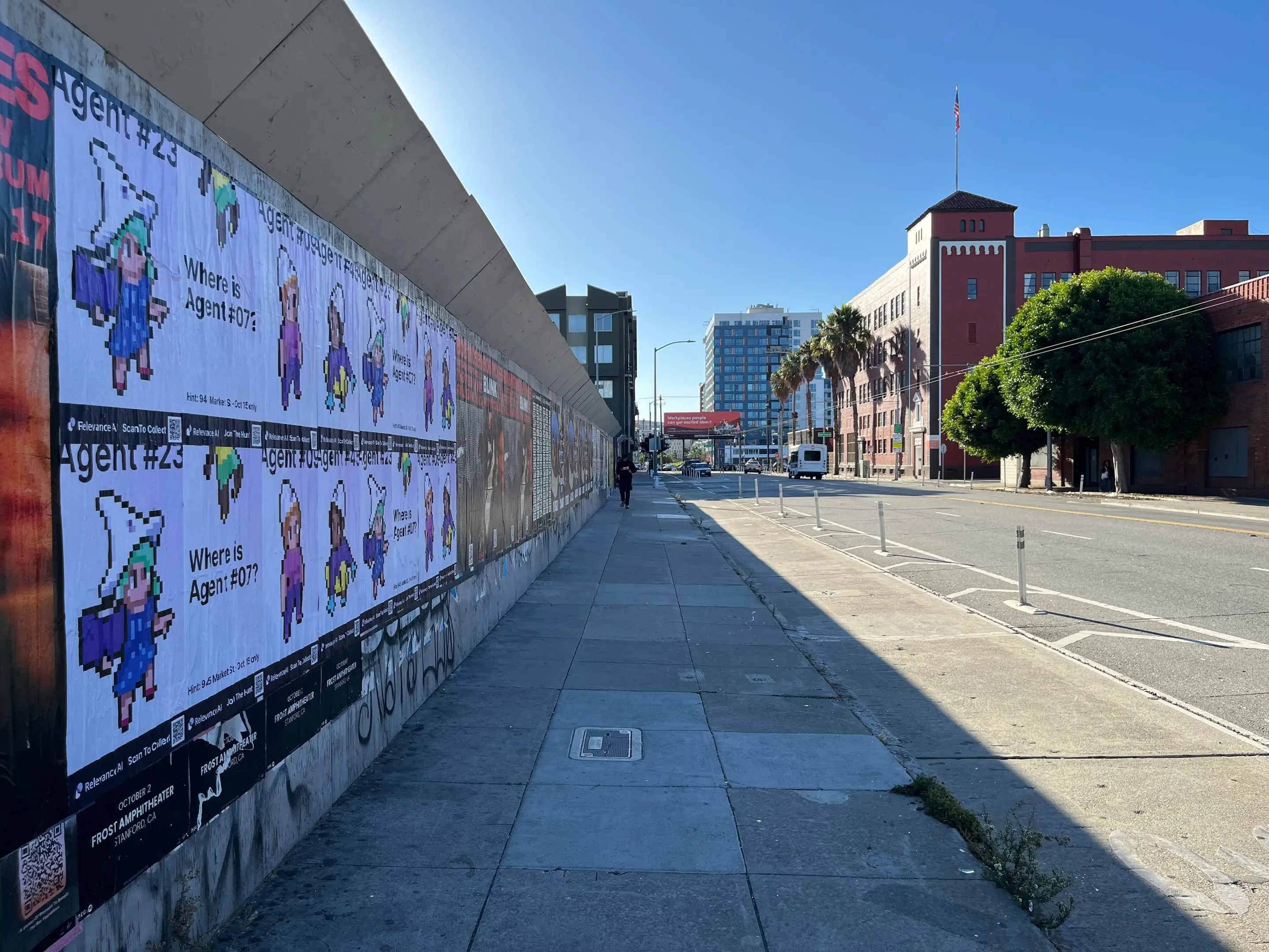 Wheatpaste poster campaign for Relevance AI on San Francisco, CA in San Francisco, CA, pixel art agent character paste-up poster install by Beyond Street Media