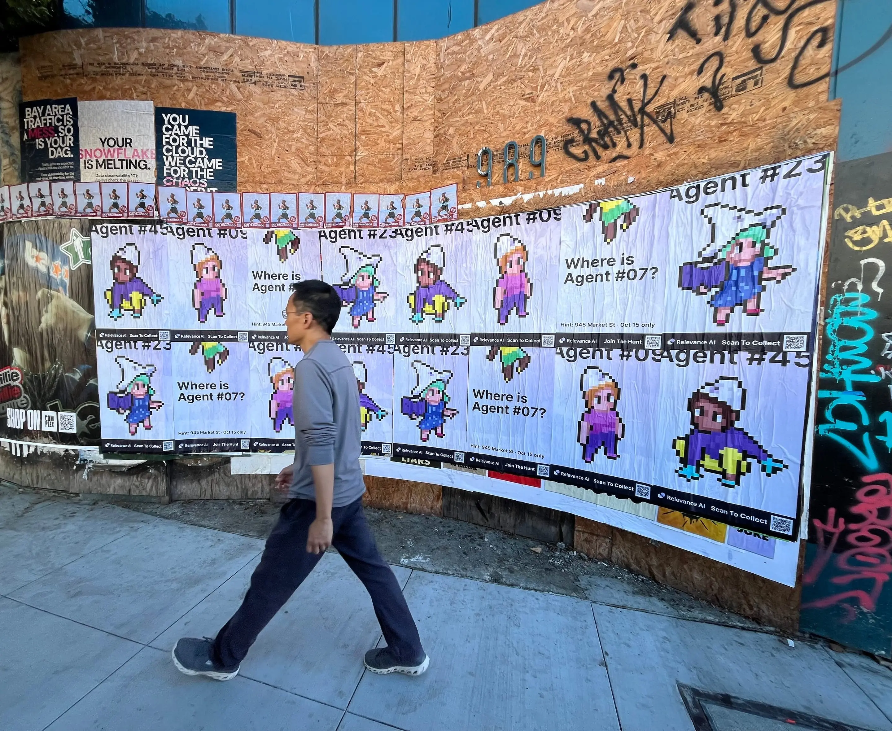 Wheatpaste poster campaign for Relevance AI on San Francisco, CA in San Francisco, CA, pixel art agent character paste-up poster install by Beyond Street Media