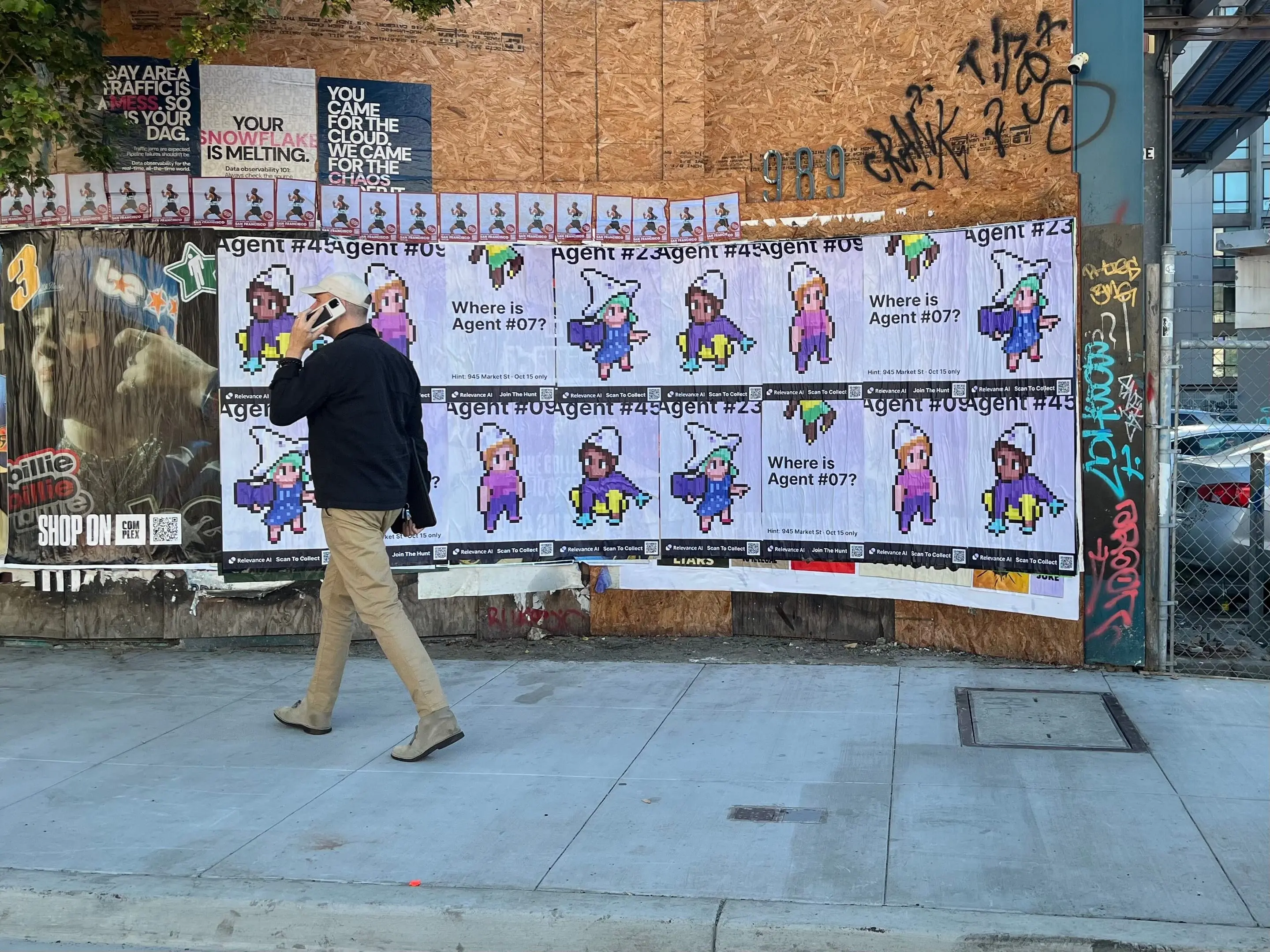 Wheatpaste poster campaign for Relevance AI on San Francisco, CA in San Francisco, CA, pixel art agent character paste-up poster install by Beyond Street Media
