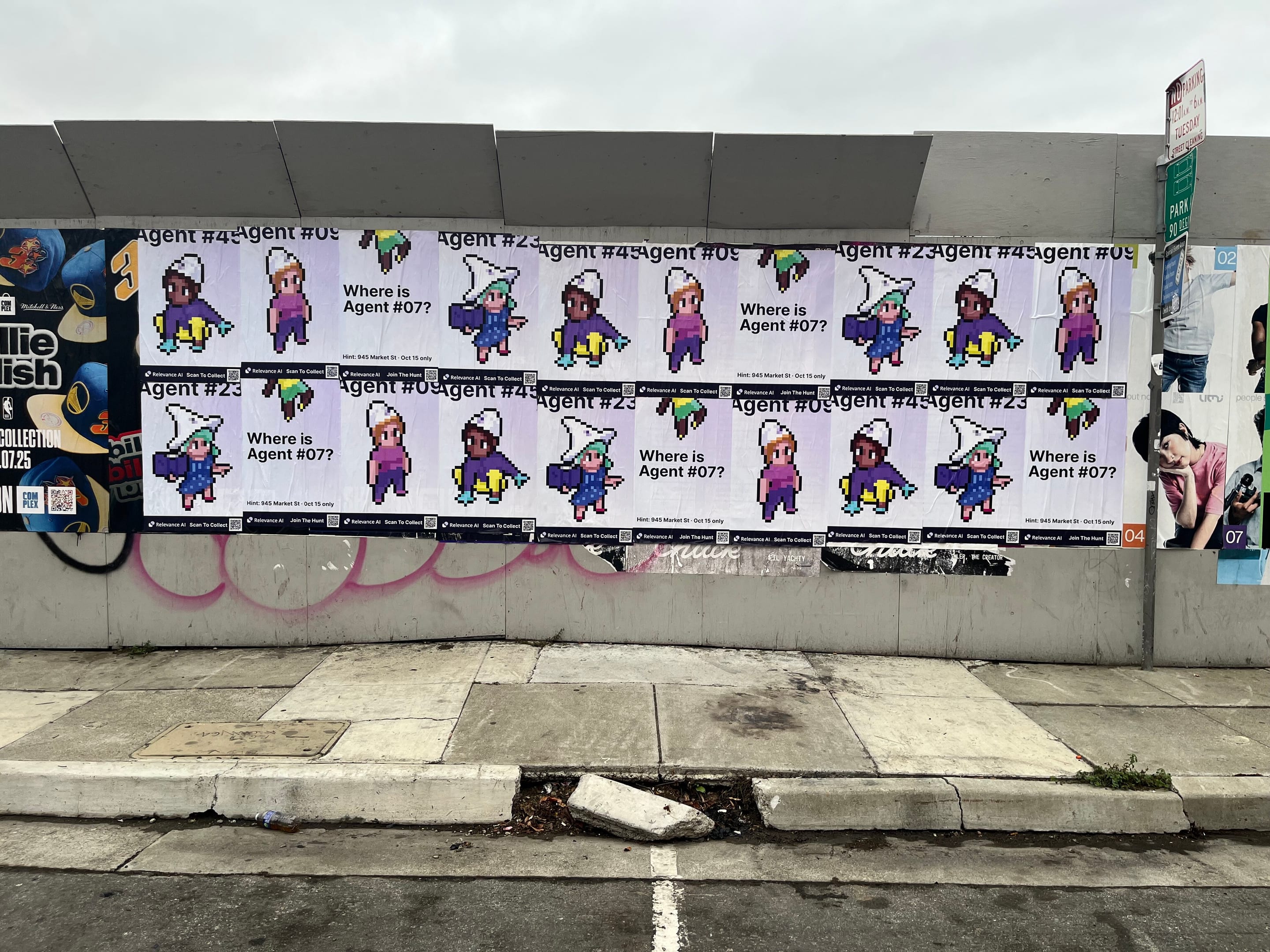 Wheatpaste poster campaign for Relevance AI on San Francisco, CA in San Francisco, CA, pixel art agent character paste-up poster install by Beyond Street Media
