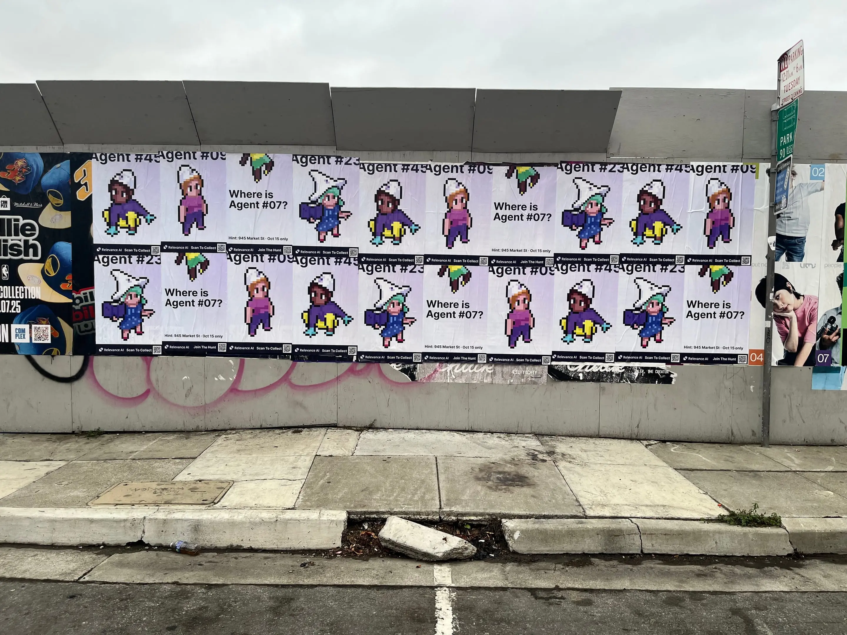 Wheatpaste poster campaign for Relevance AI on San Francisco, CA in San Francisco, CA, pixel art agent character paste-up poster install by Beyond Street Media