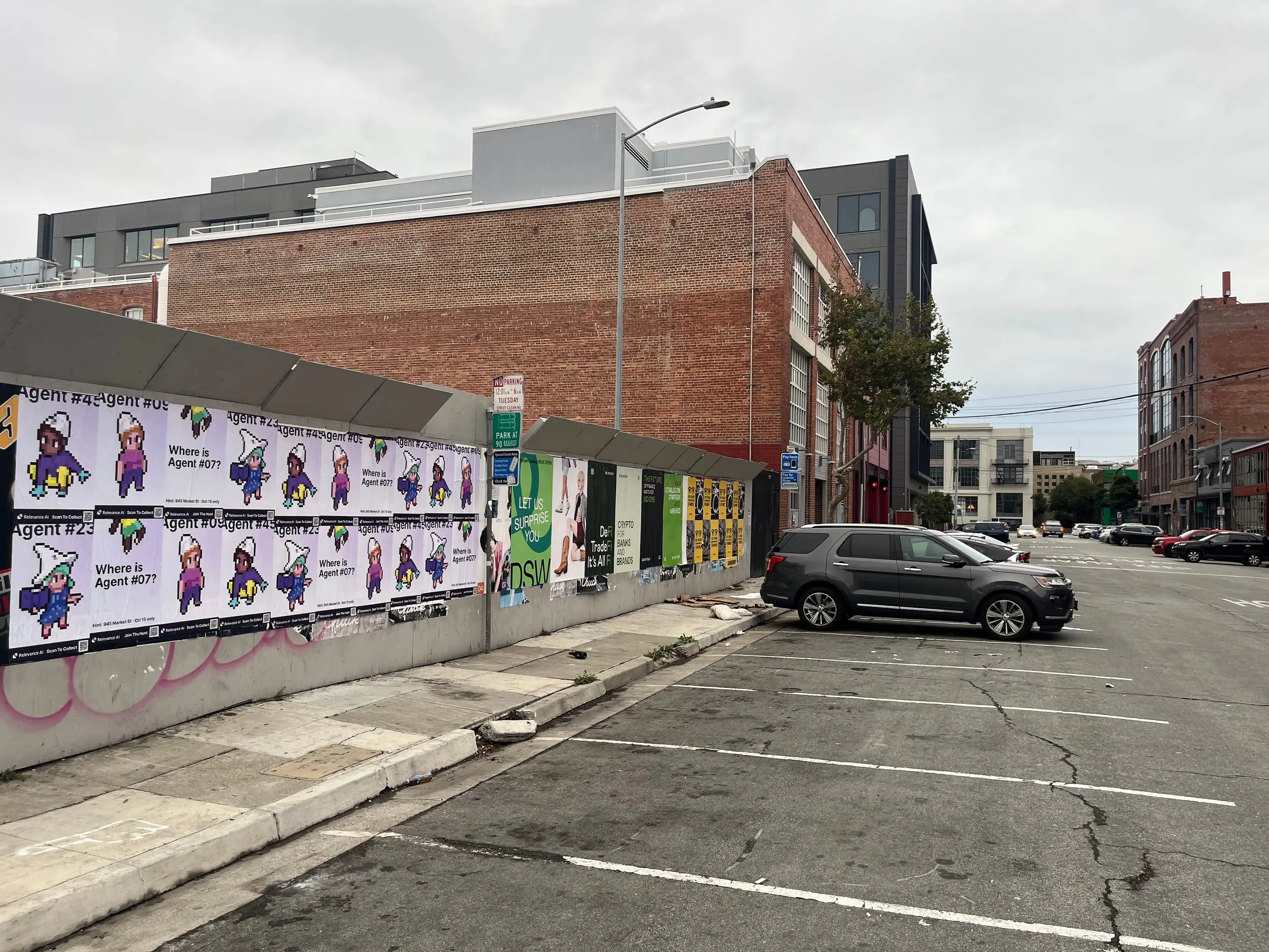 Wheatpaste poster campaign for Relevance AI on San Francisco, CA in San Francisco, CA, pixel art agent character paste-up poster install by Beyond Street Media