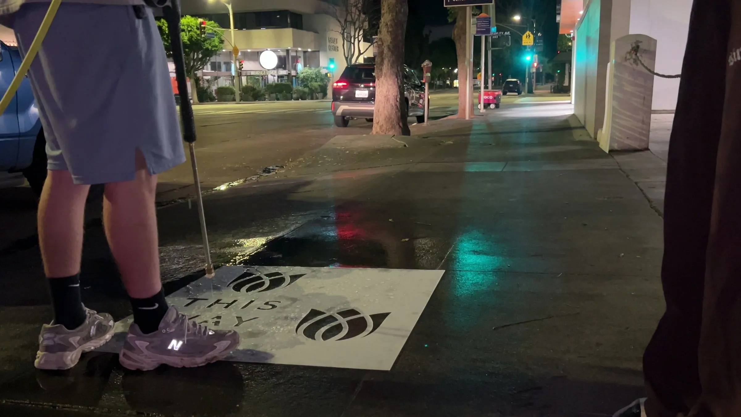 Reverse stencil clean-tag install for Bloomeffects on a New York City sidewalk by Beyond Street Media.