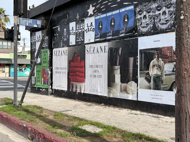Sézane 'A Très Parisian Holiday in LA' wheatpaste campaign on Sunset Blvd, Los Angeles by Beyond Street Media