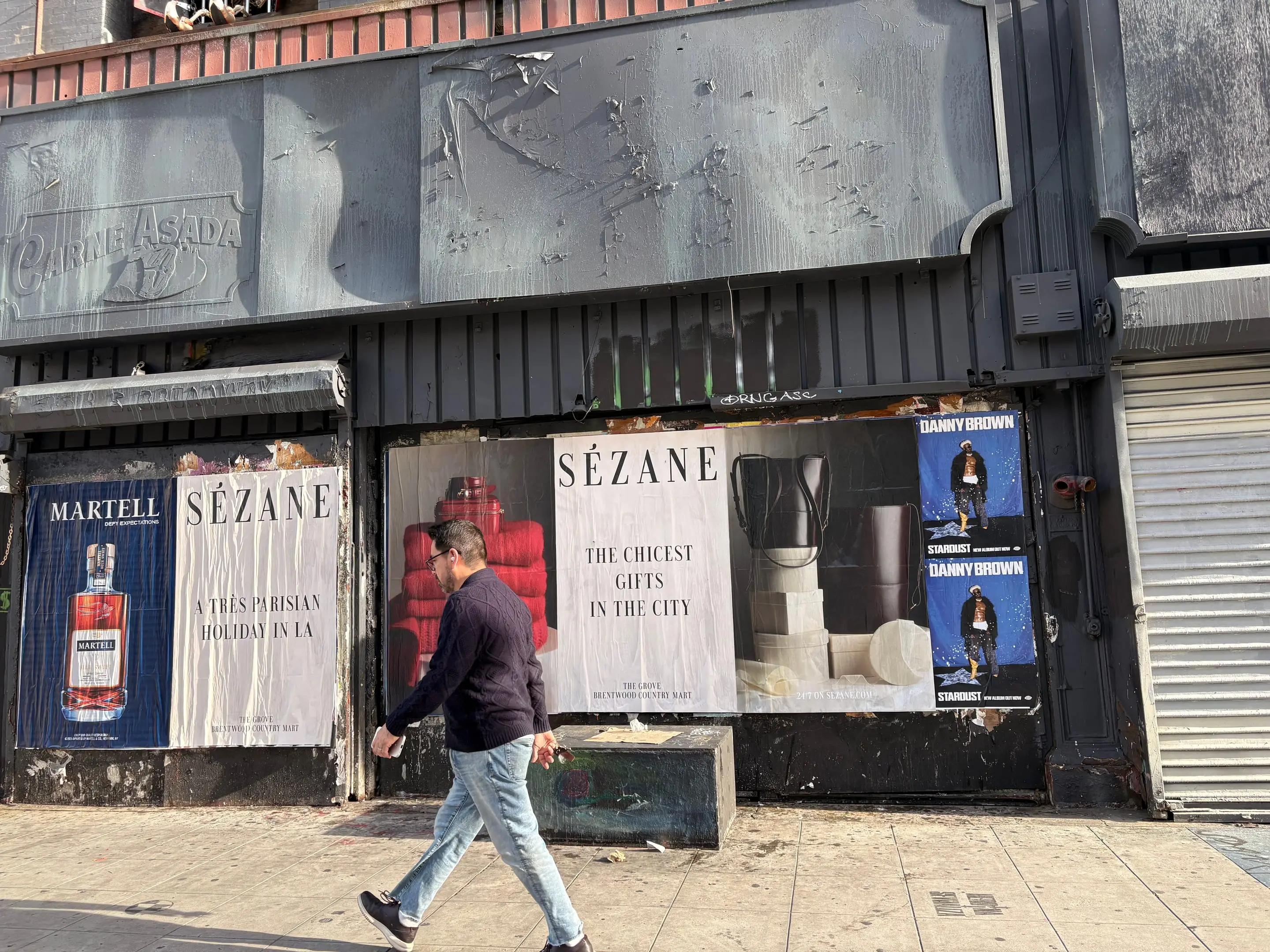 Sézane 'A Très Parisian Holiday in LA' wheatpaste campaign on Sunset Blvd, Los Angeles by Beyond Street Media