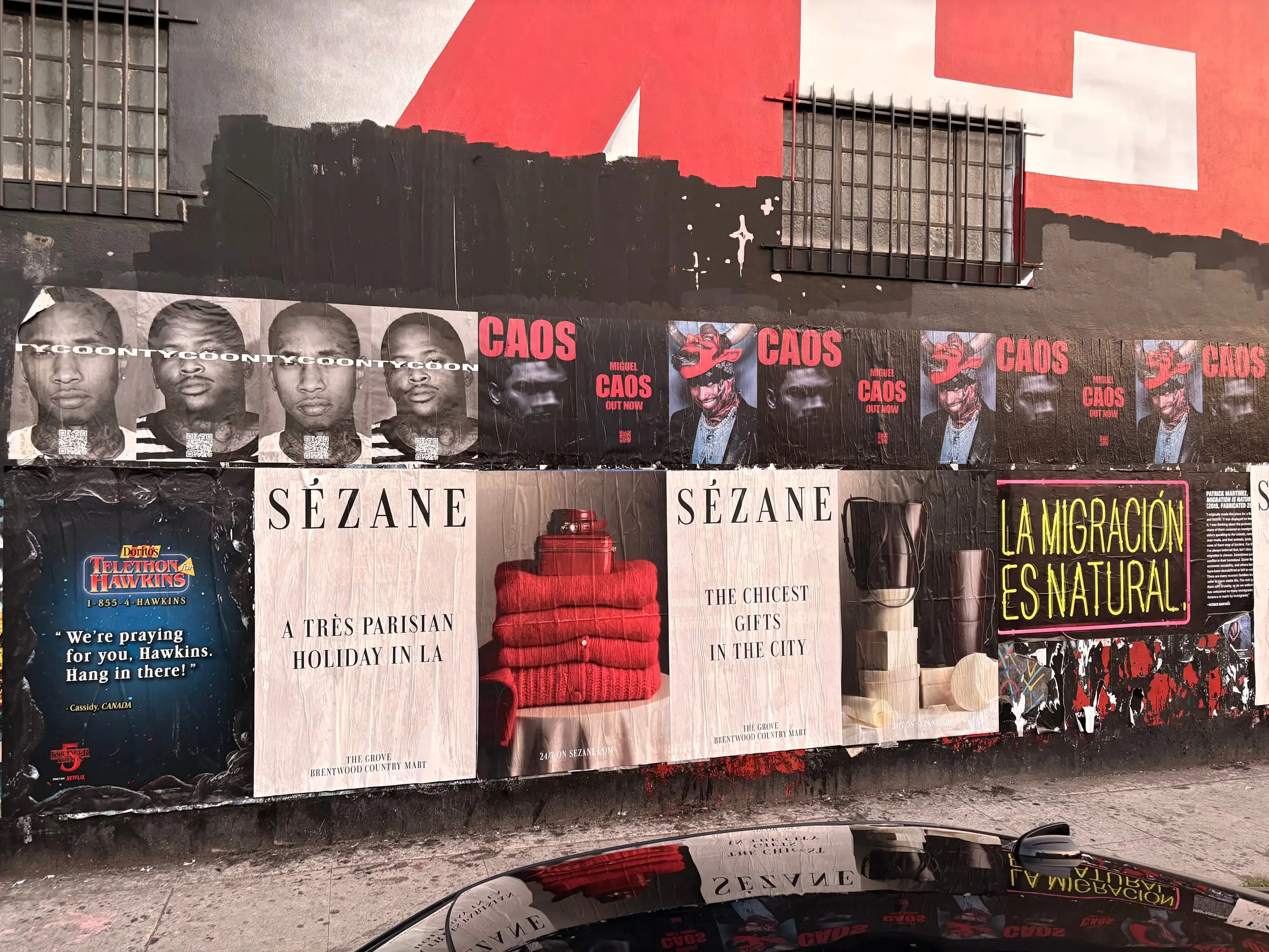 Sézane 'A Très Parisian Holiday in LA' wheatpaste campaign on Sunset Blvd, Los Angeles by Beyond Street Media